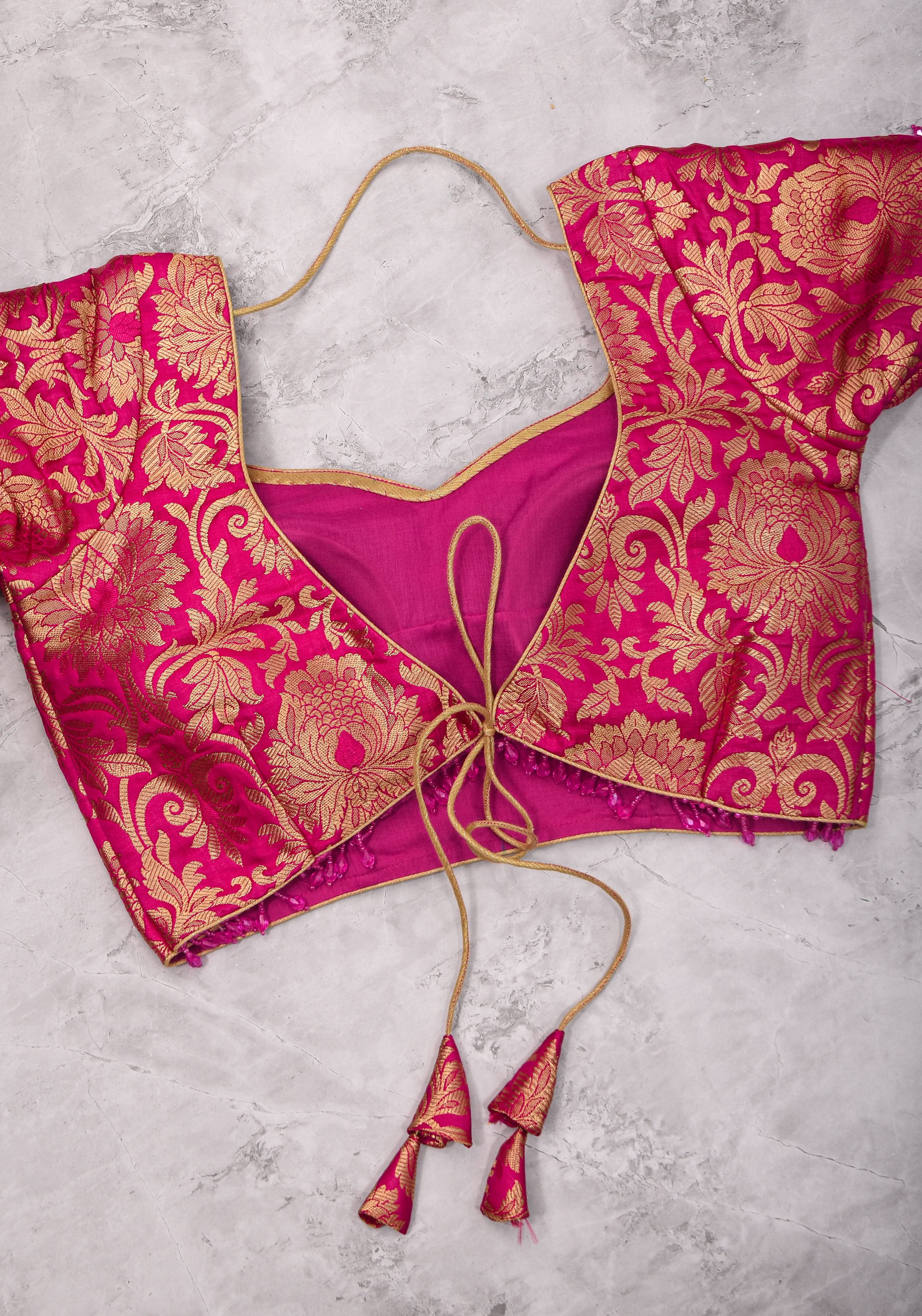 Rani Pink Banarasi Brocade Blouse with Back tie design and dangling beads | Shobitam