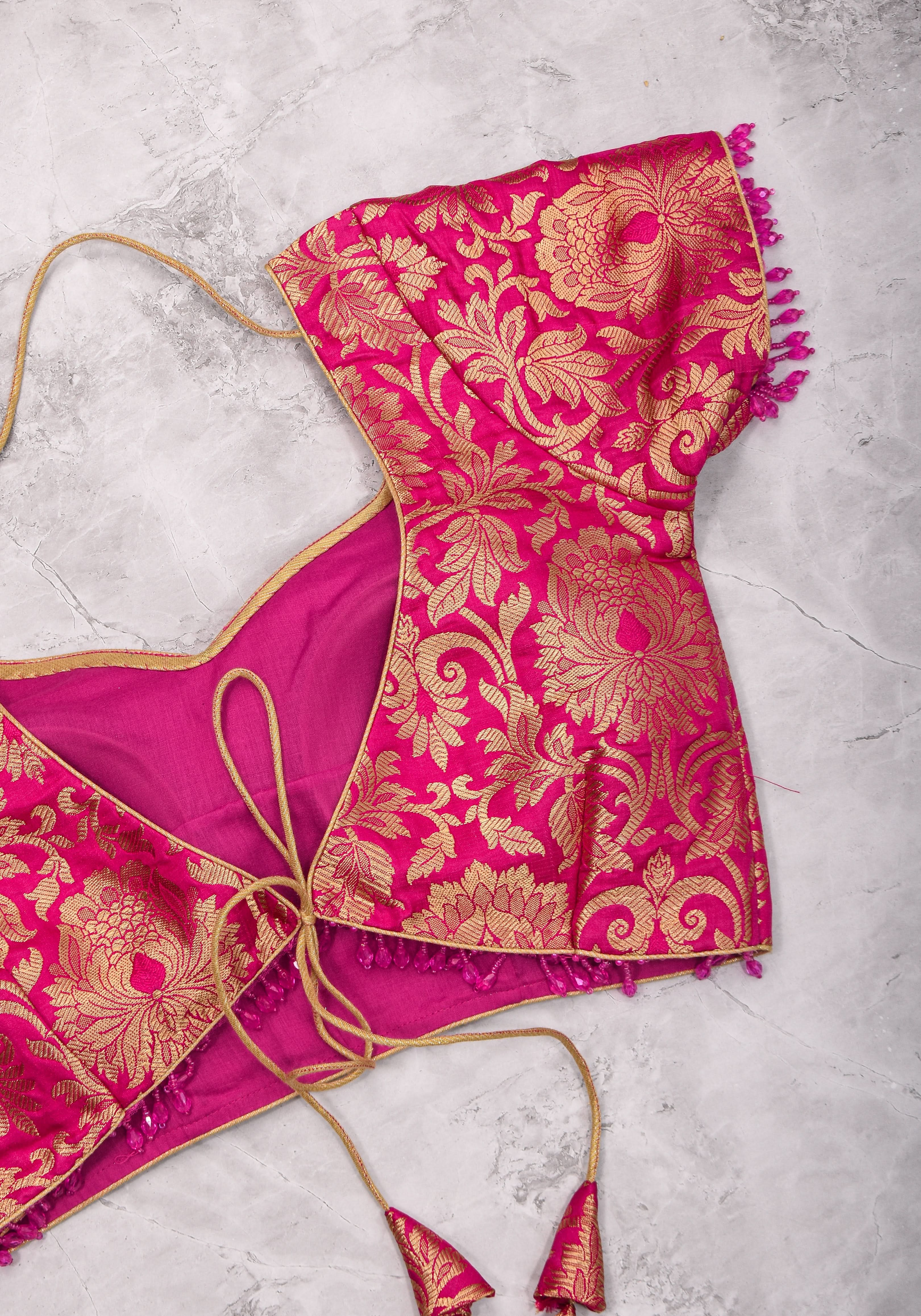 Rani Pink Banarasi Brocade Blouse with Back tie design and dangling beads | Shobitam