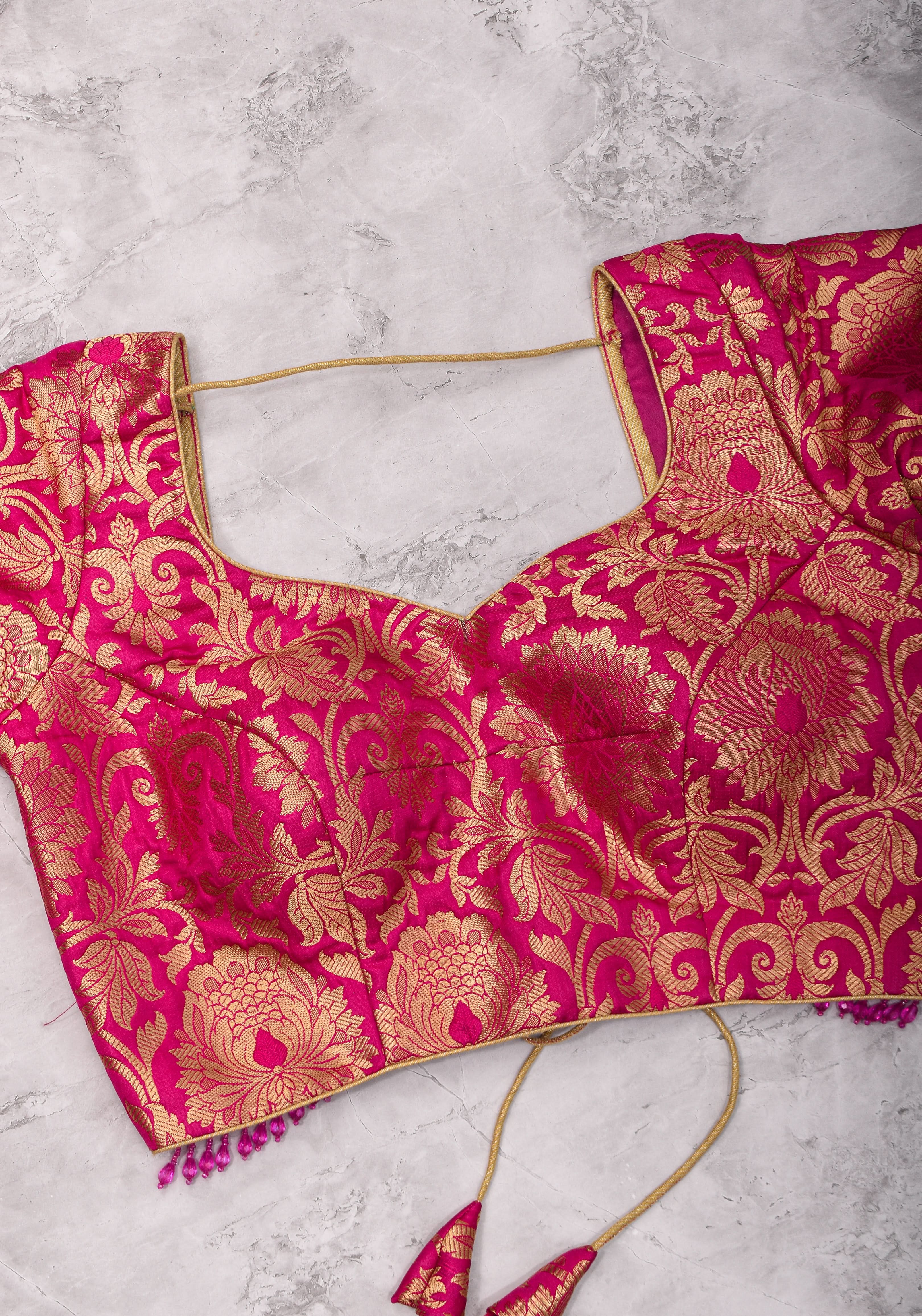 Rani Pink Banarasi Brocade Blouse with Back tie design and dangling beads | Shobitam