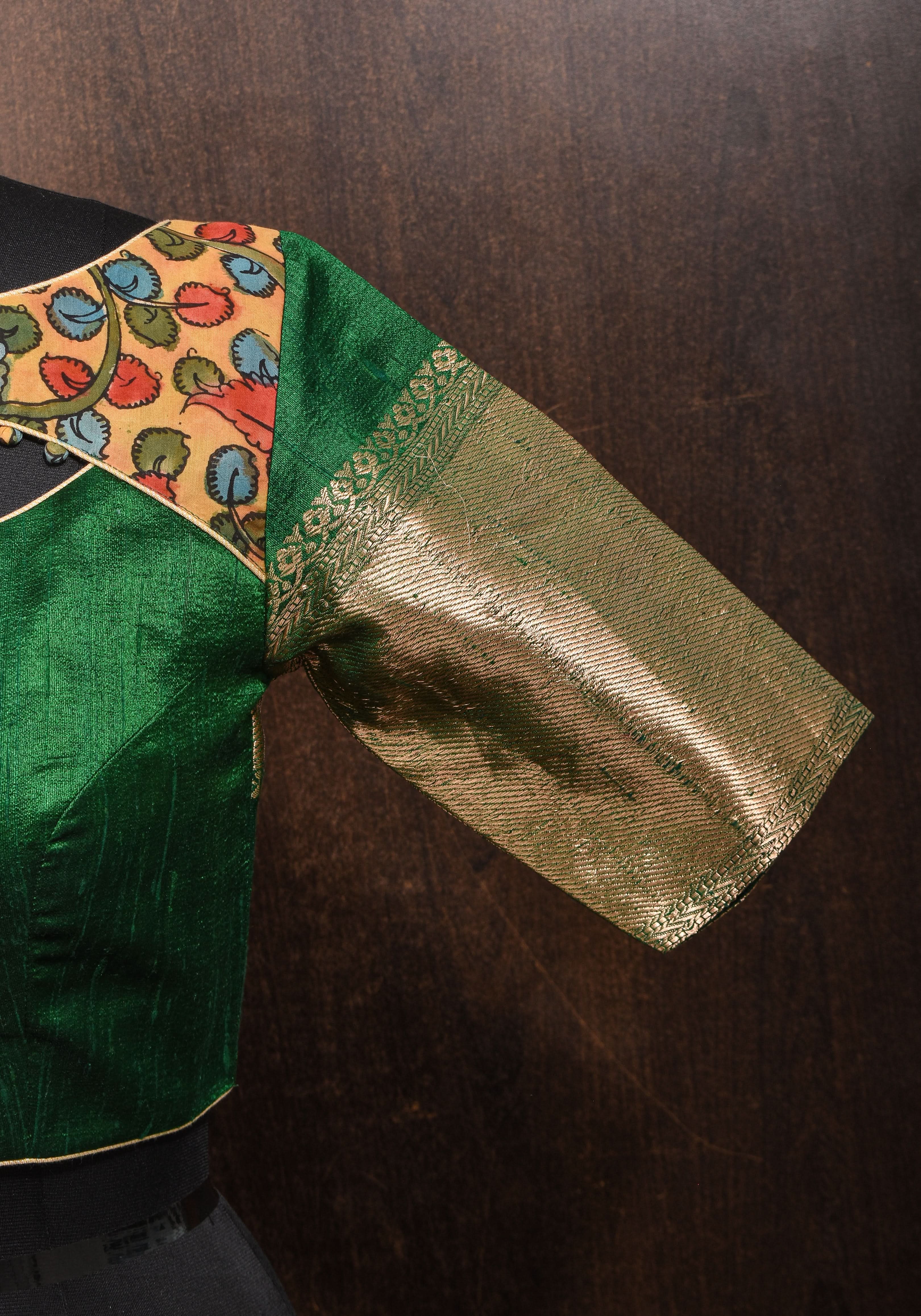Pure Raw Silk Blouse in Emerlad Green with Kalamkari Yoke Cutout pattern | Shobitam