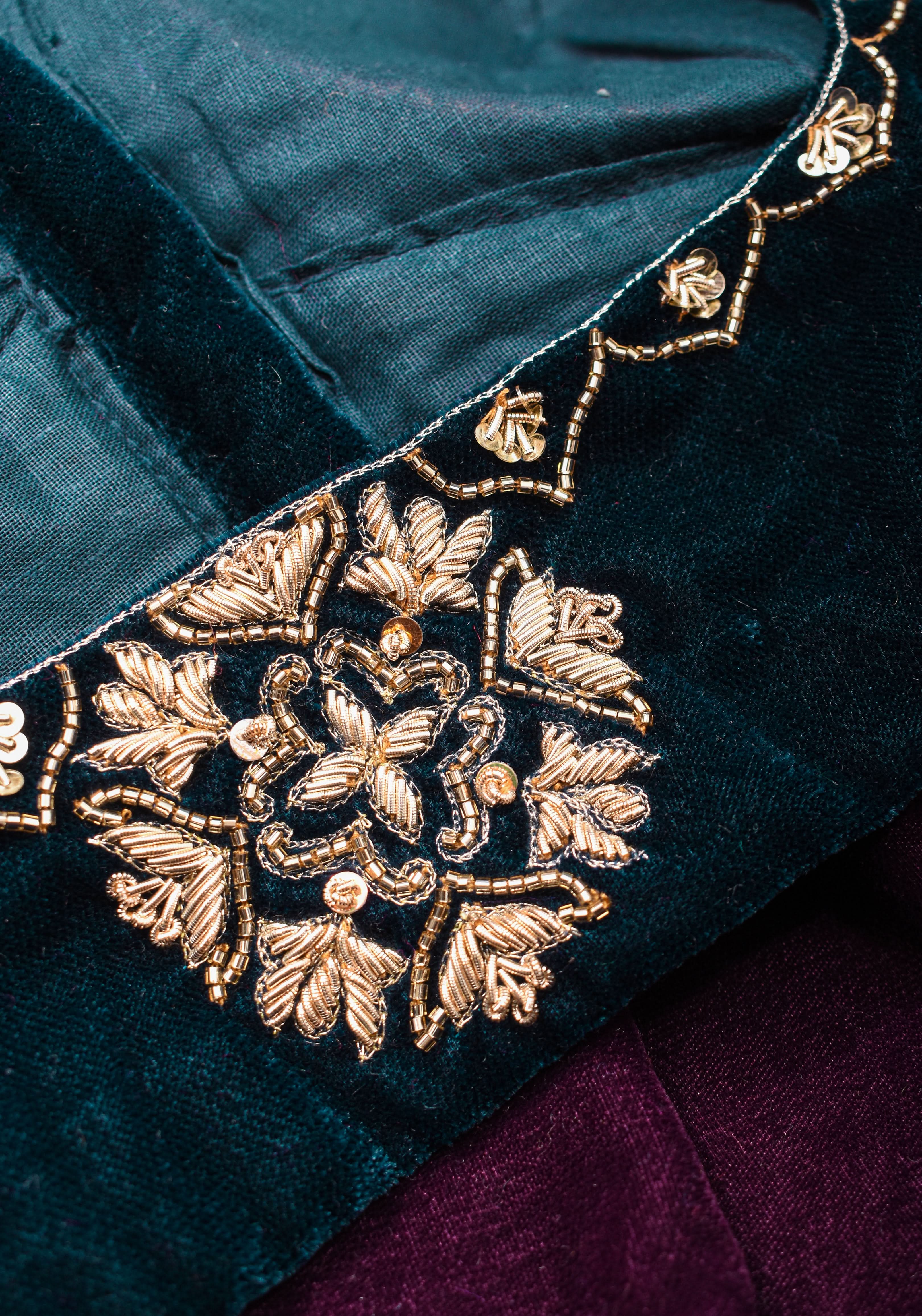 Made to Order: Dark Green Velvet Blouse with Embroidered and Glass Bead detailing | Shobitam