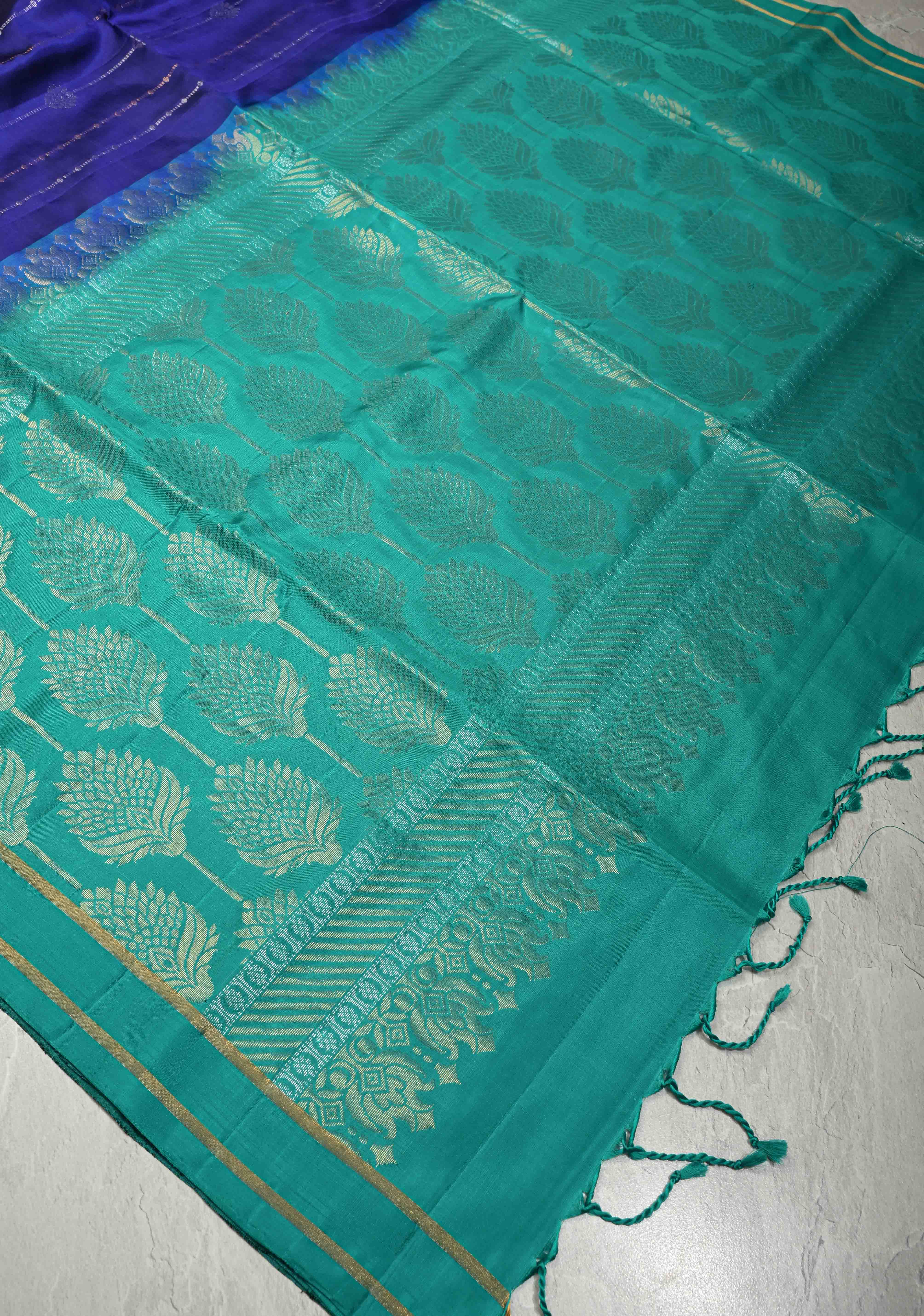 Deep Ink Blue Dual Tone Pure Kanjivaram Soft Silk Saree with Gold-Silver Zari Stripes and Contrast Rama Green Minimal Zari Border | SILK MARK CERTIFIED | Shobitam