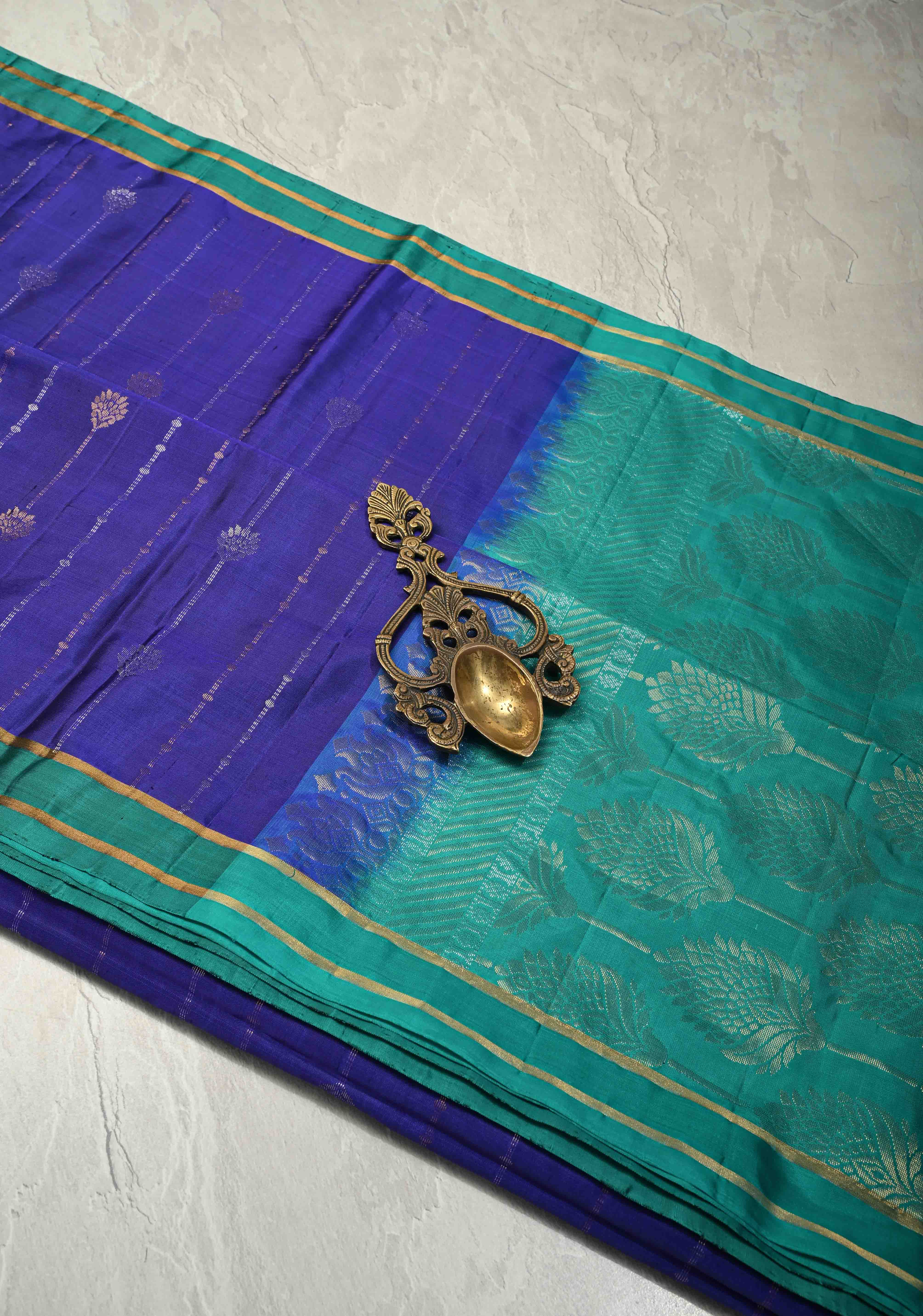 Deep Ink Blue Dual Tone Pure Kanjivaram Soft Silk Saree with Gold-Silver Zari Stripes and Contrast Rama Green Minimal Zari Border | SILK MARK CERTIFIED | Shobitam