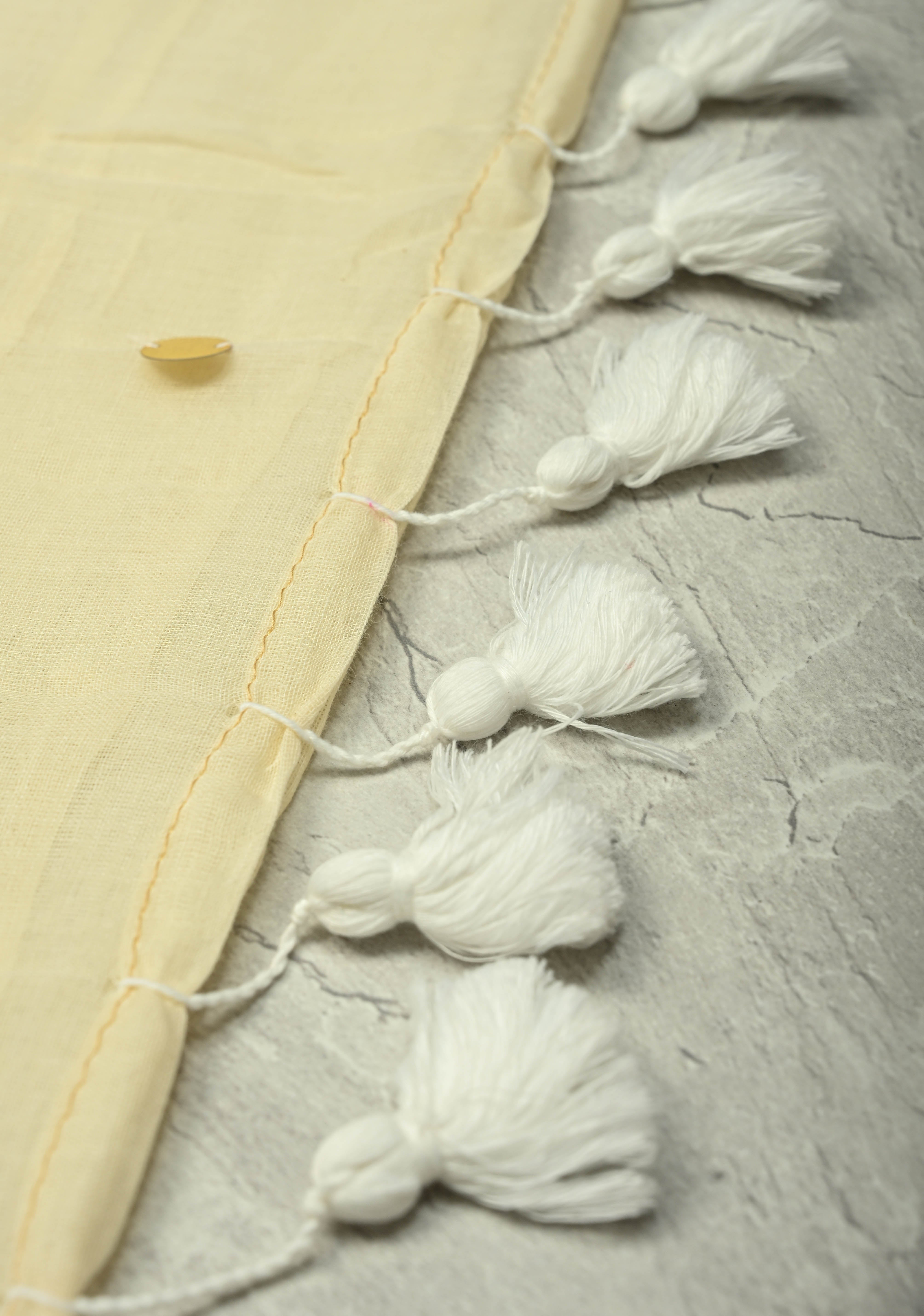 Off White Mul Cotton saree in With Tikki work and Long Tassels,  No Blouse Piece | Shobitam