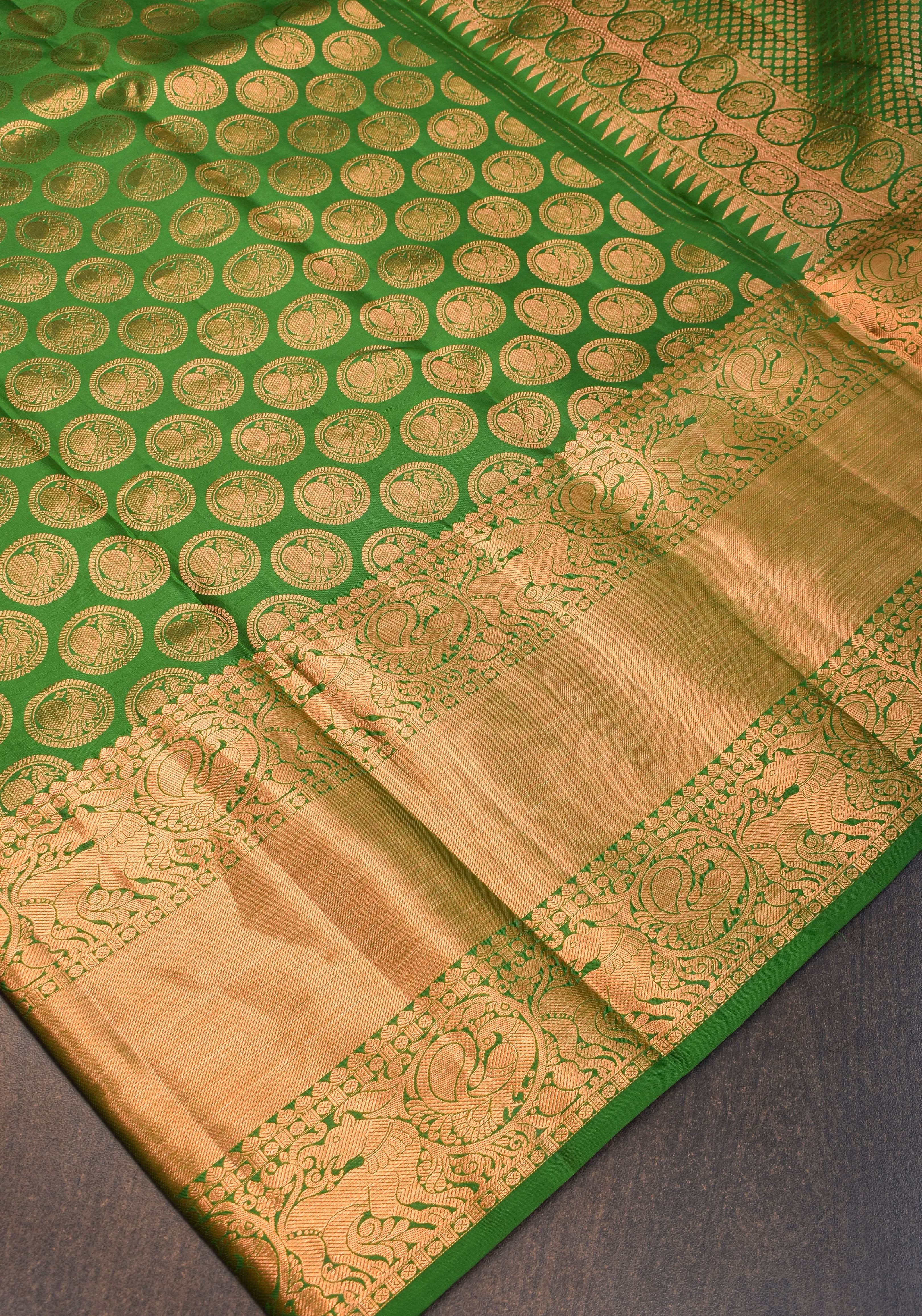 Exquisite Celebrity Grand Brocade Kanjivaram Pure Silk Saree in Leaf Green with Intricate Pallu and Zari  | SILK MARK CERTIFIED | Shobitam