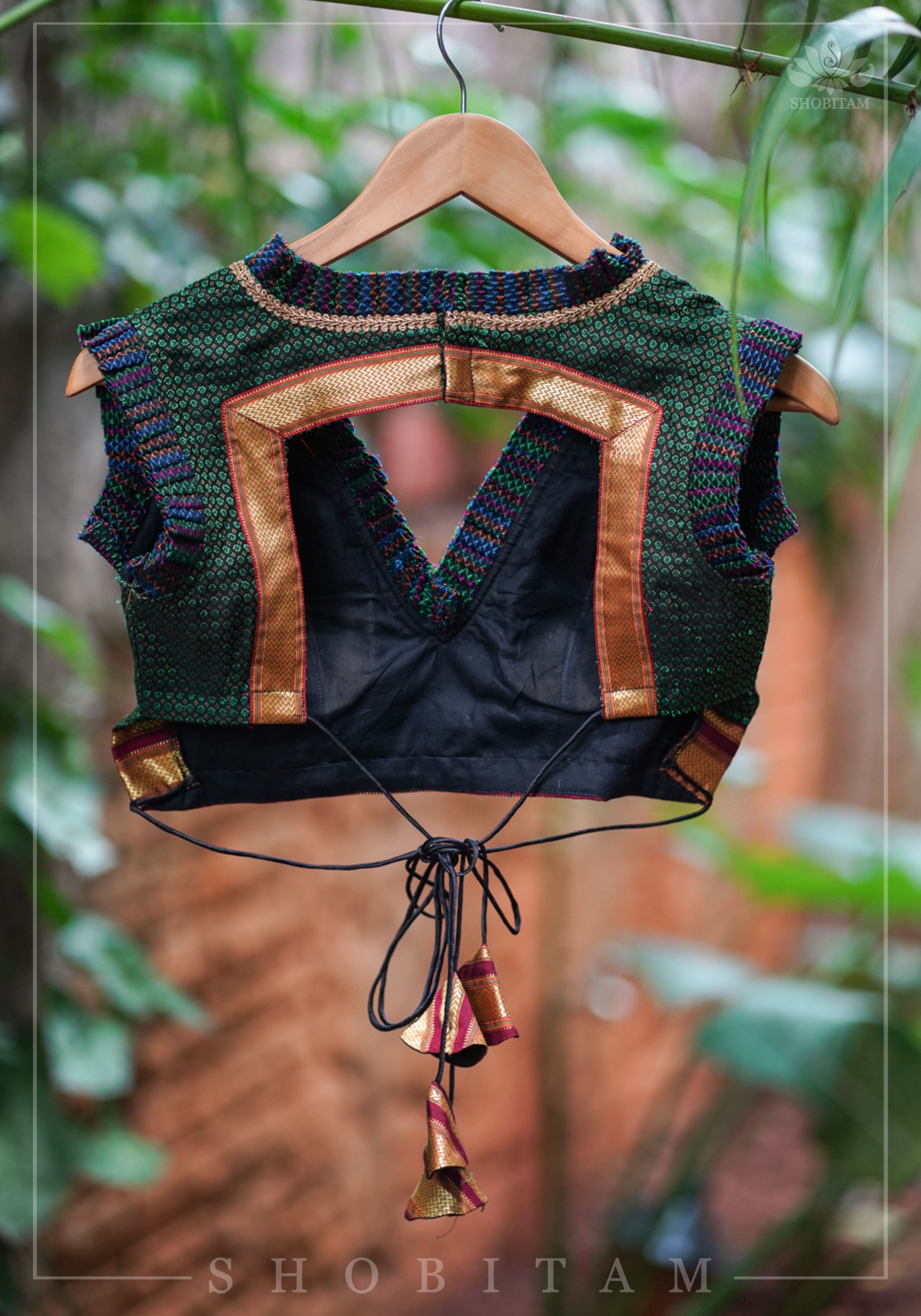 Dark green & black khana silk V neck blouse with frill detailing and backless design< made to order | Shobitam