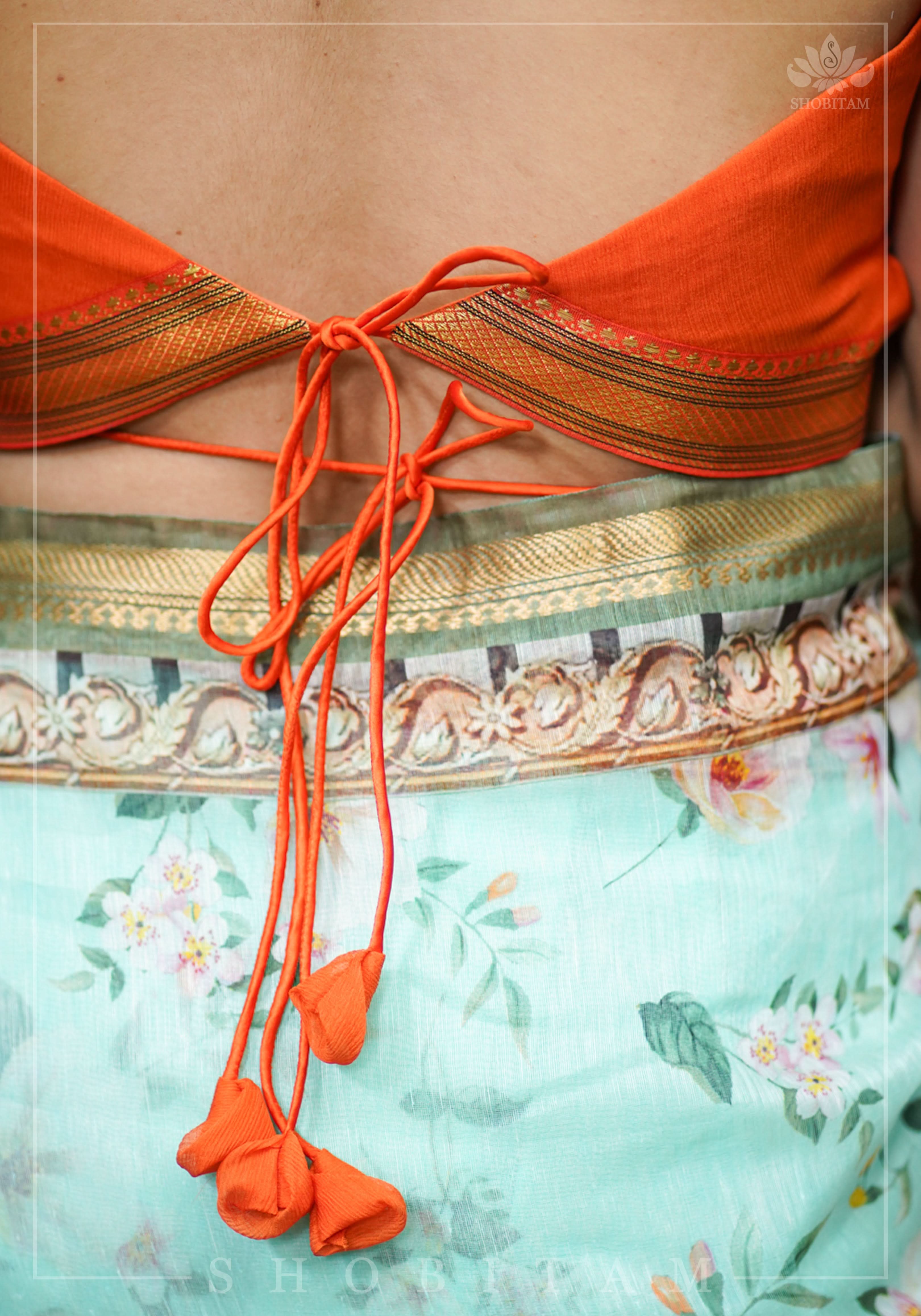 Orange chiffon sweetheart neck blouse with ruffle sleeves | Shobitam
