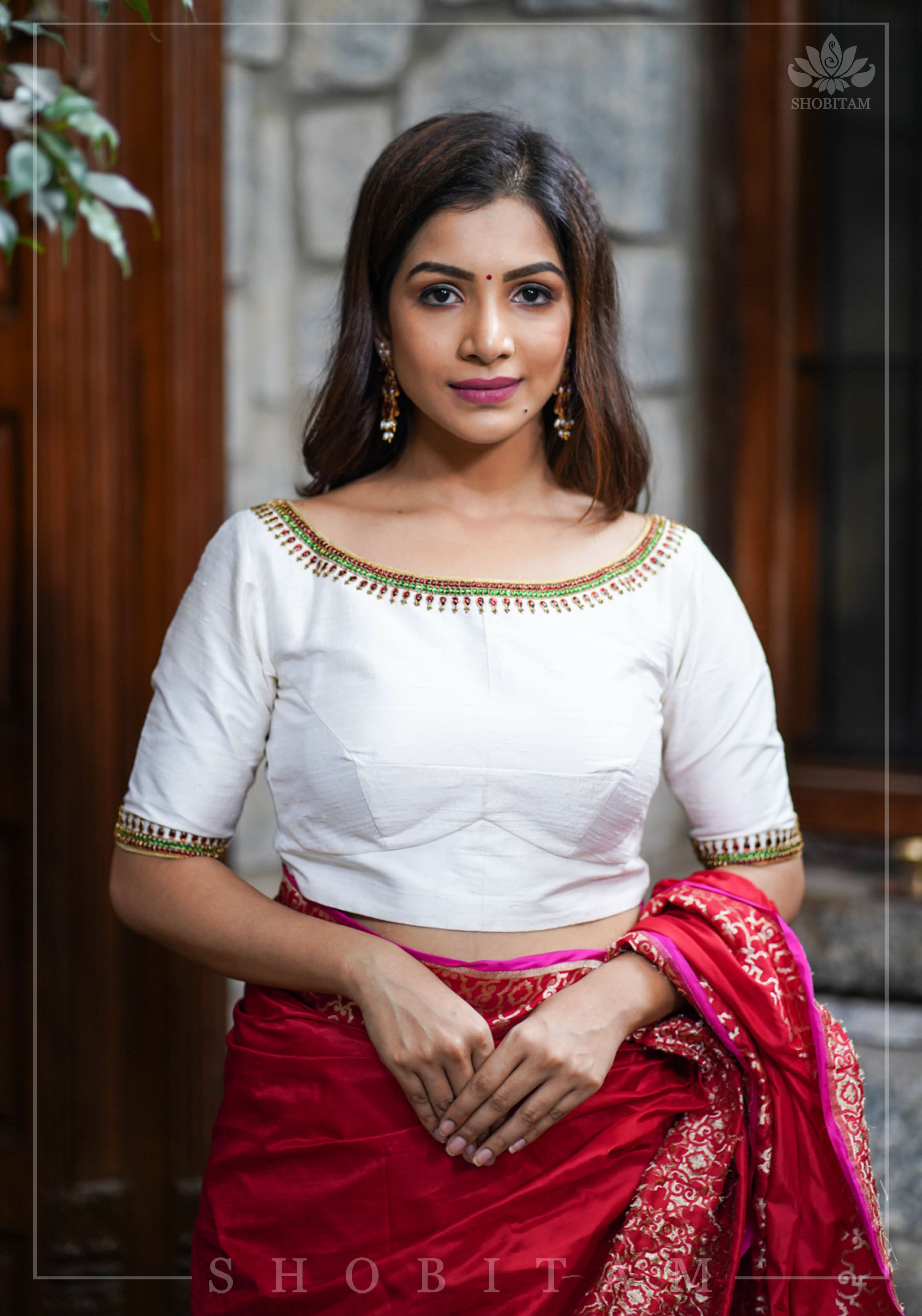 Ivory Pure Raw Silk Blouse with Kemp work detailing on boat neck and Jadau back buttons | Shobitam