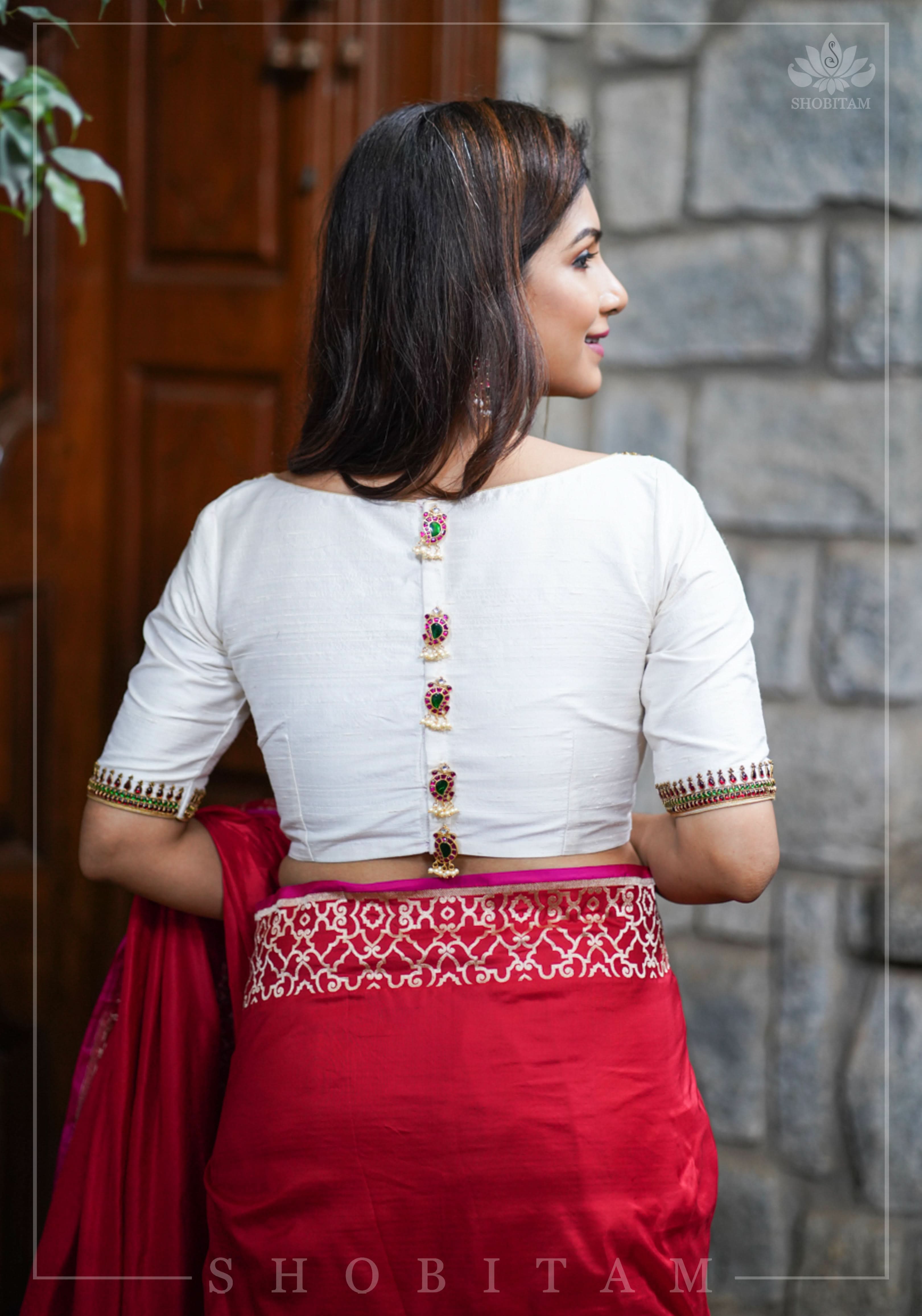 Ivory Pure Raw Silk Blouse with Kemp work detailing on boat neck and Jadau back buttons | Shobitam