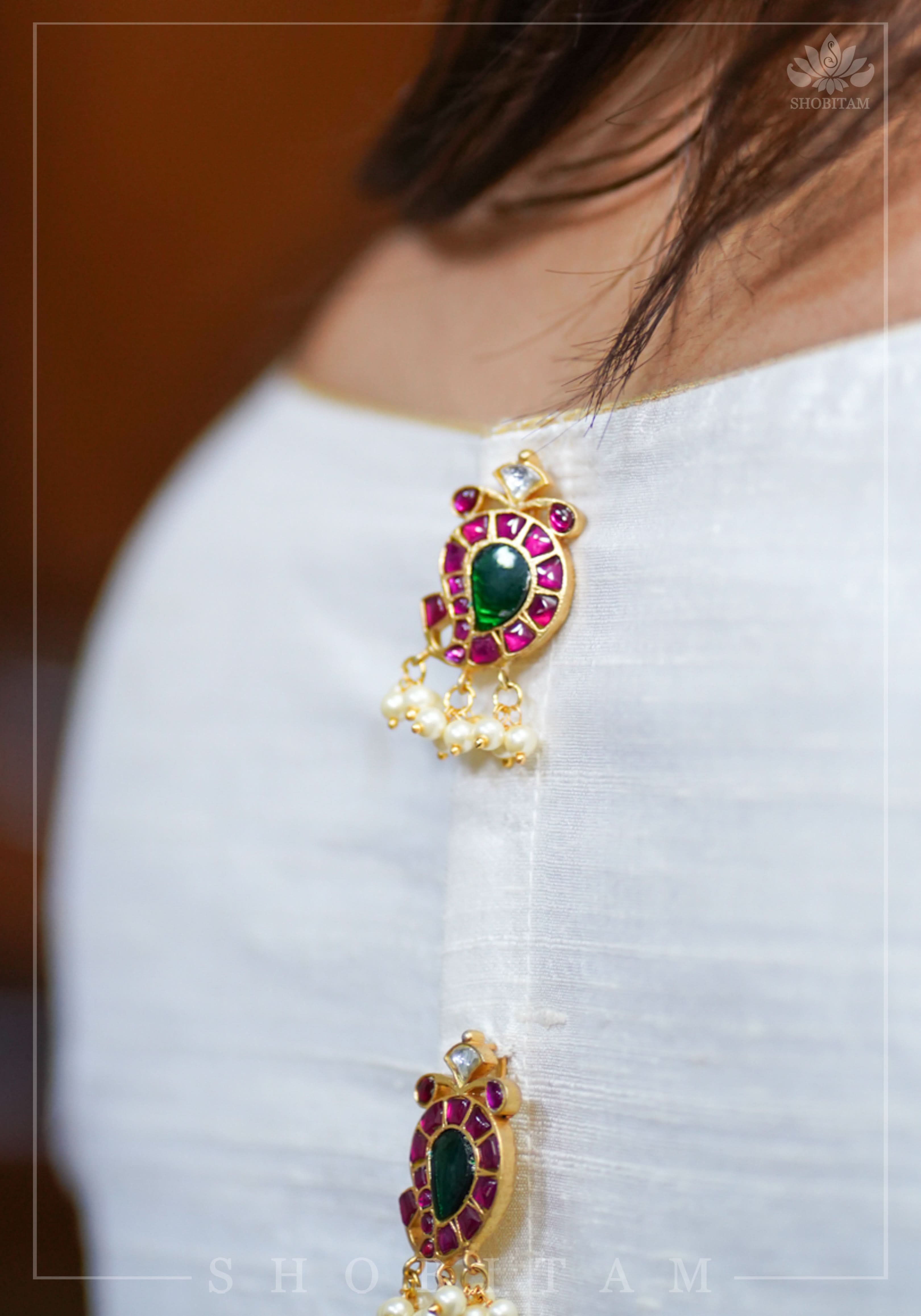 Ivory Pure Raw Silk Blouse with Kemp work detailing on boat neck and Jadau back buttons | Shobitam