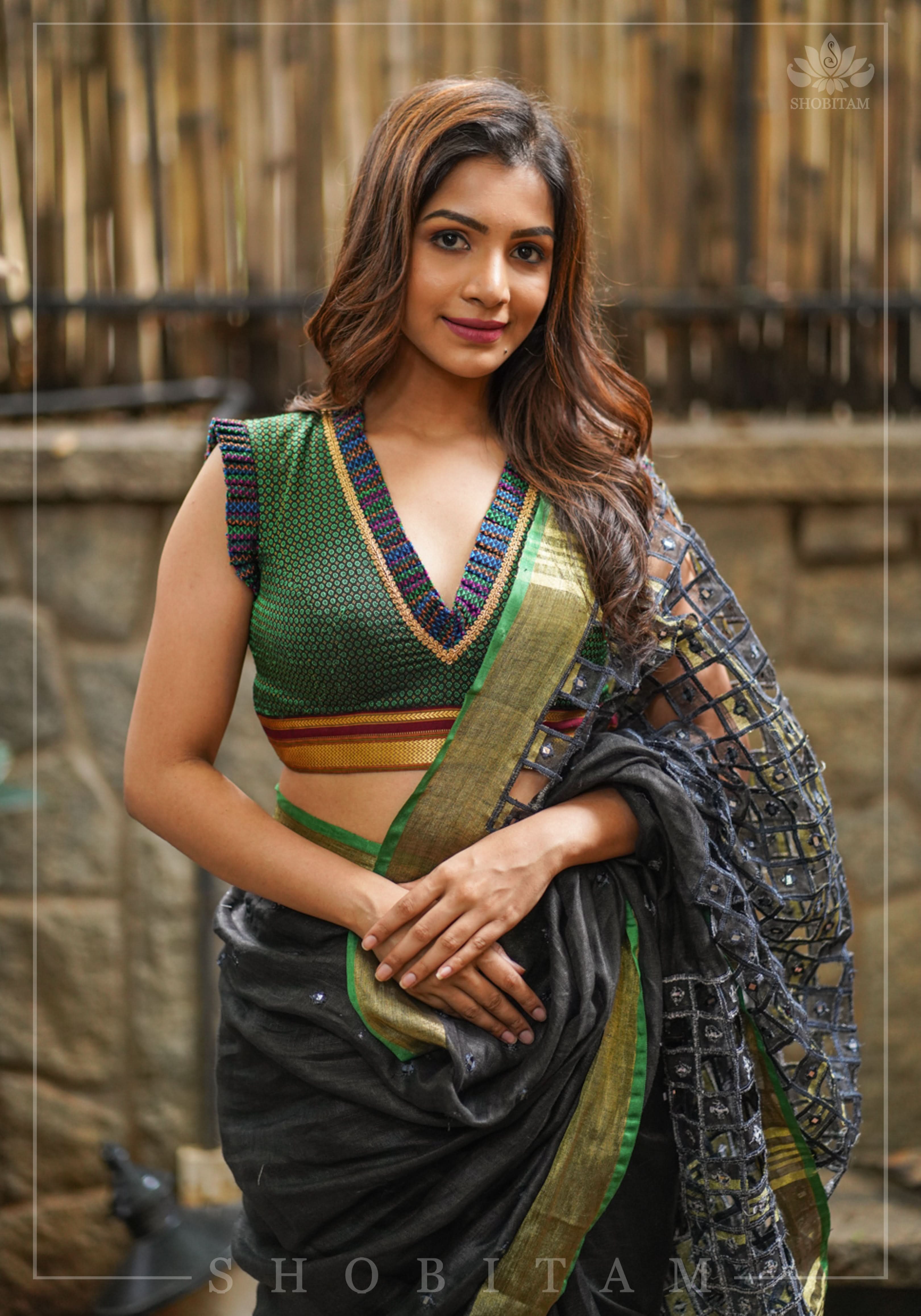 Dark green & black khana silk V neck blouse with frill detailing and backless design< made to order | Shobitam