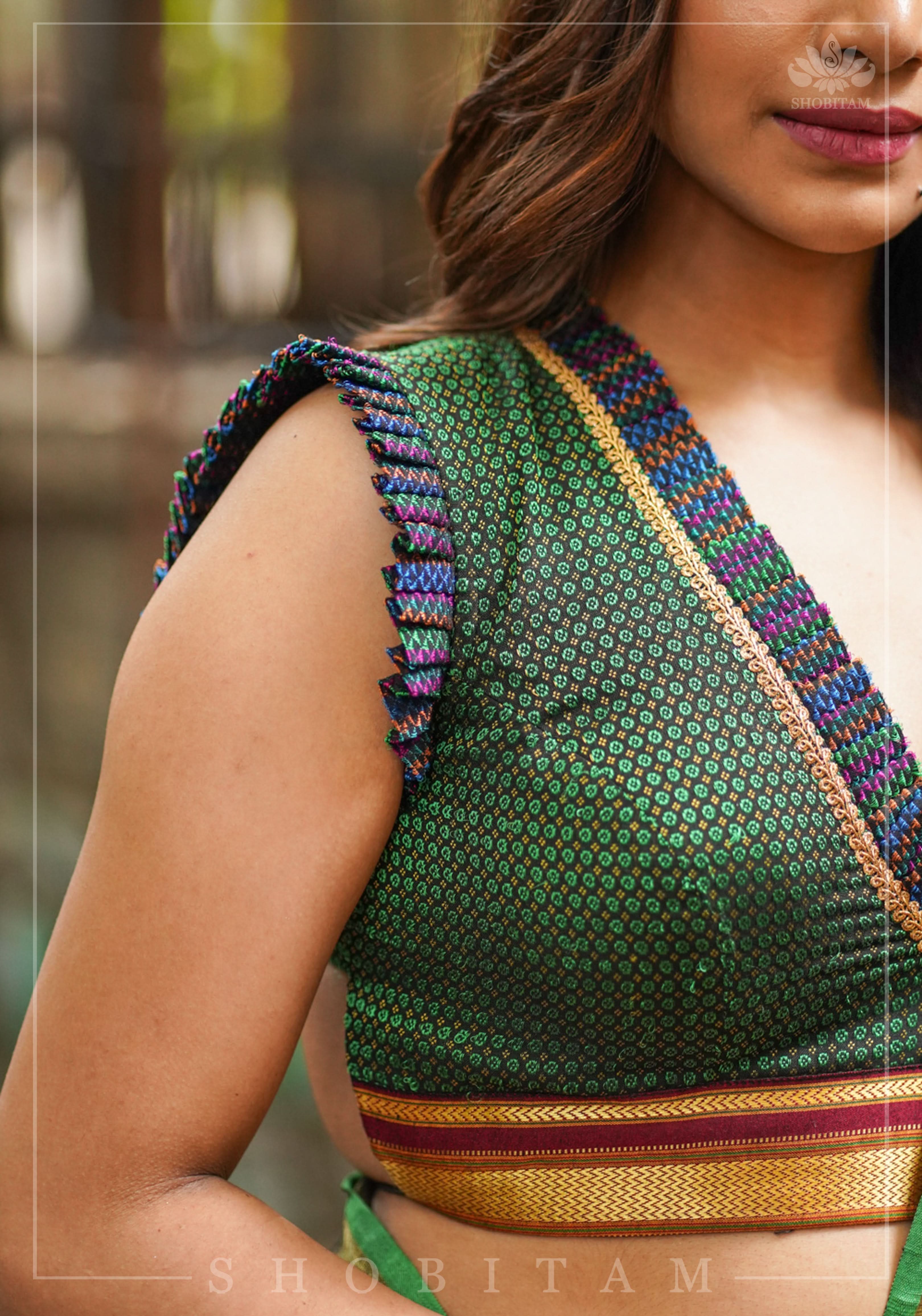 Dark green & black khana silk V neck blouse with frill detailing and backless design< made to order | Shobitam