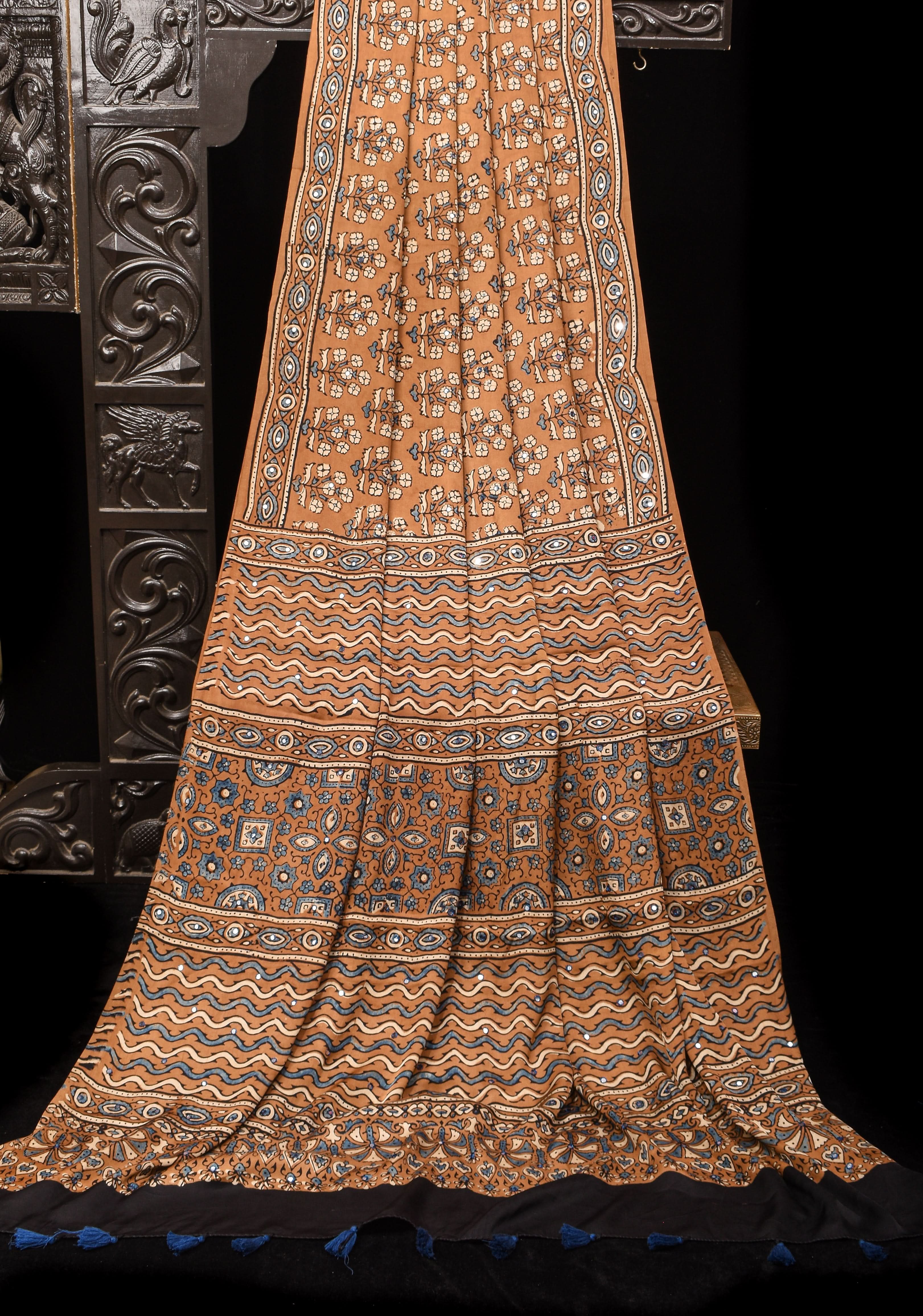 Camel Brown Ajrakh Block Print Modal Saree with Floral Print Pattern and Mirror Hand embroidery work | Shobitam
