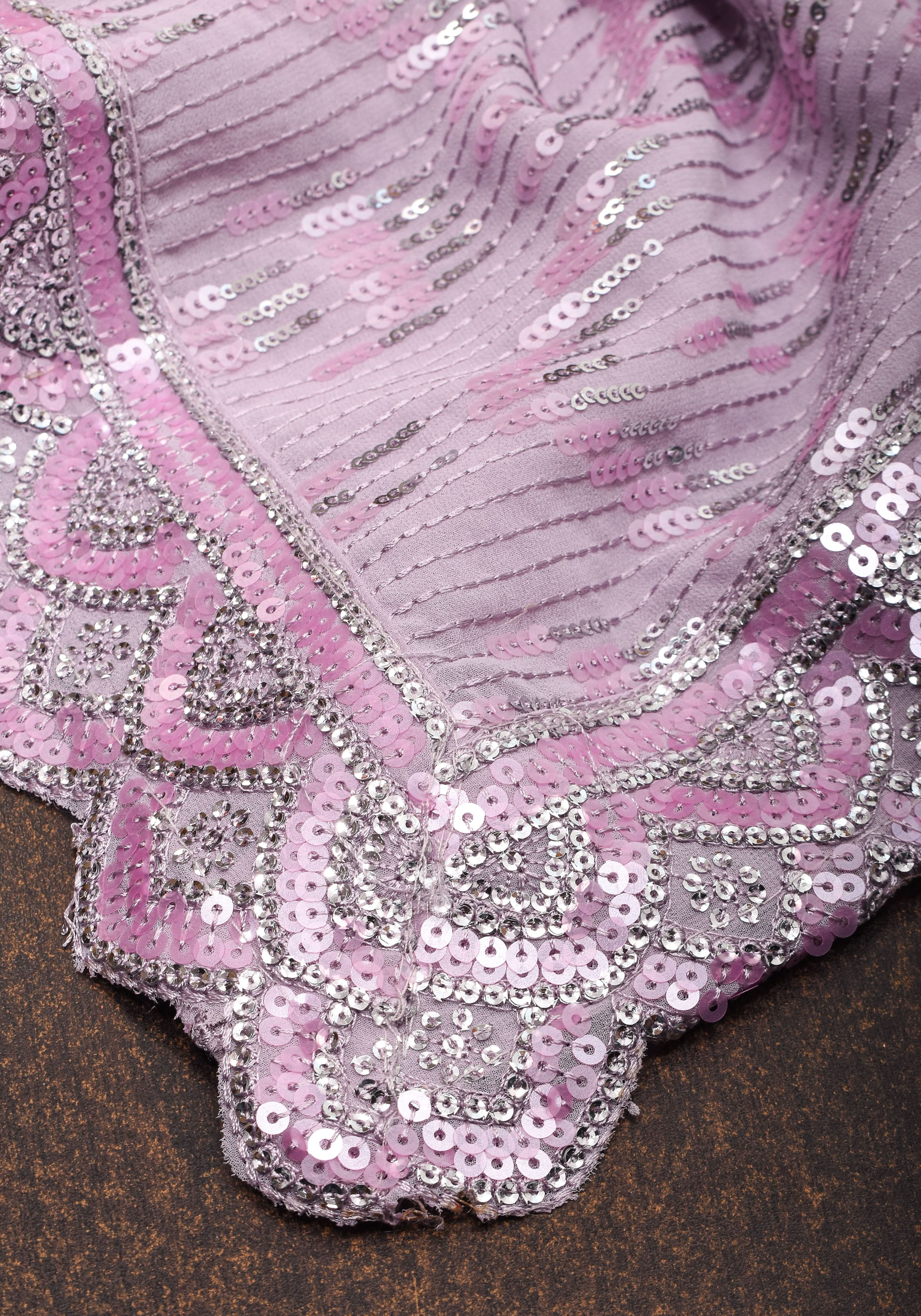 Full Sequins Embellished Georgette Saree in mauve with Scalloped border | Shobitam