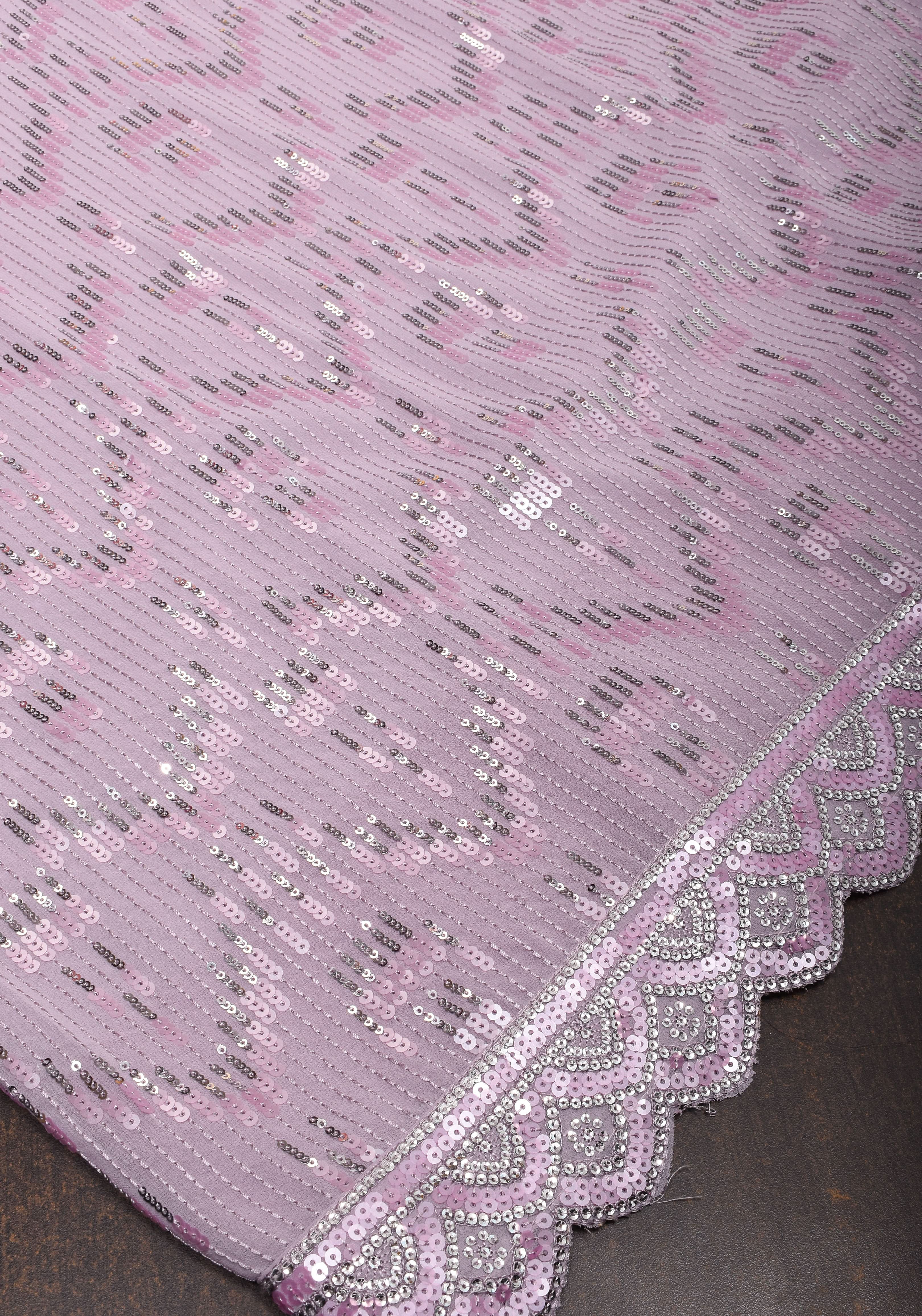 Full Sequins Embellished Georgette Saree in mauve with Scalloped border | Shobitam