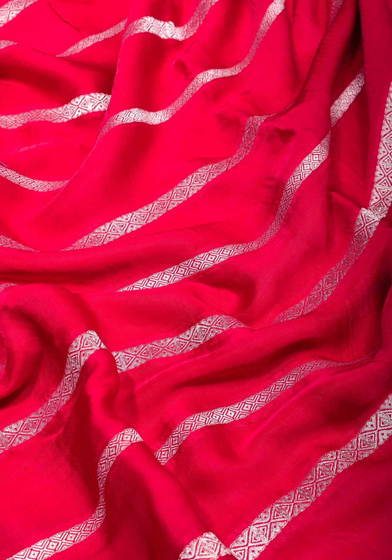 Predrape Viscose Satin Saree With Silver Zari Stripes and Pichwai Pallu In Reddish Pink Wrap in 1 minute saree