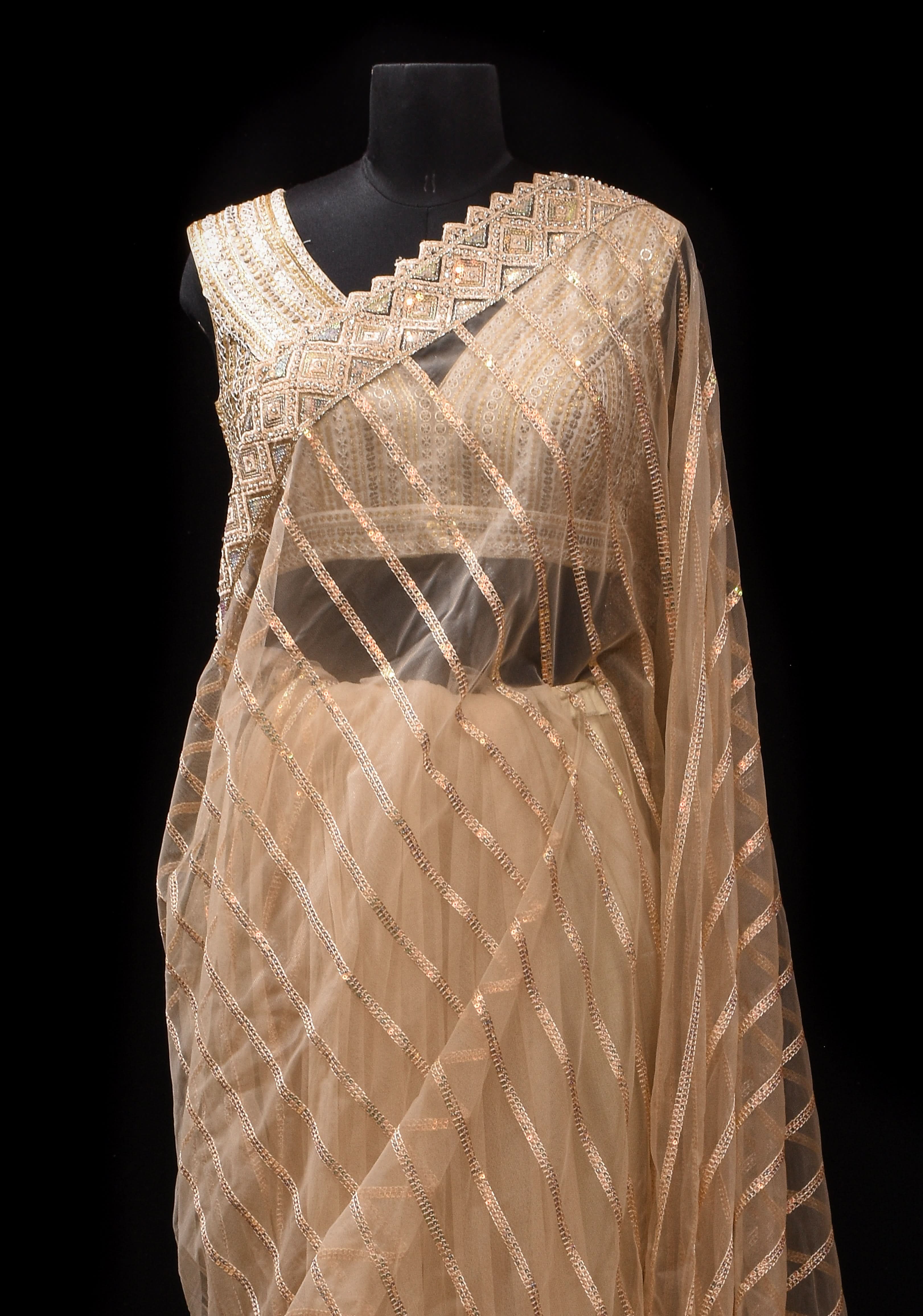 Beige tone Stripes Design Sequins on Net Saree | Shobitam