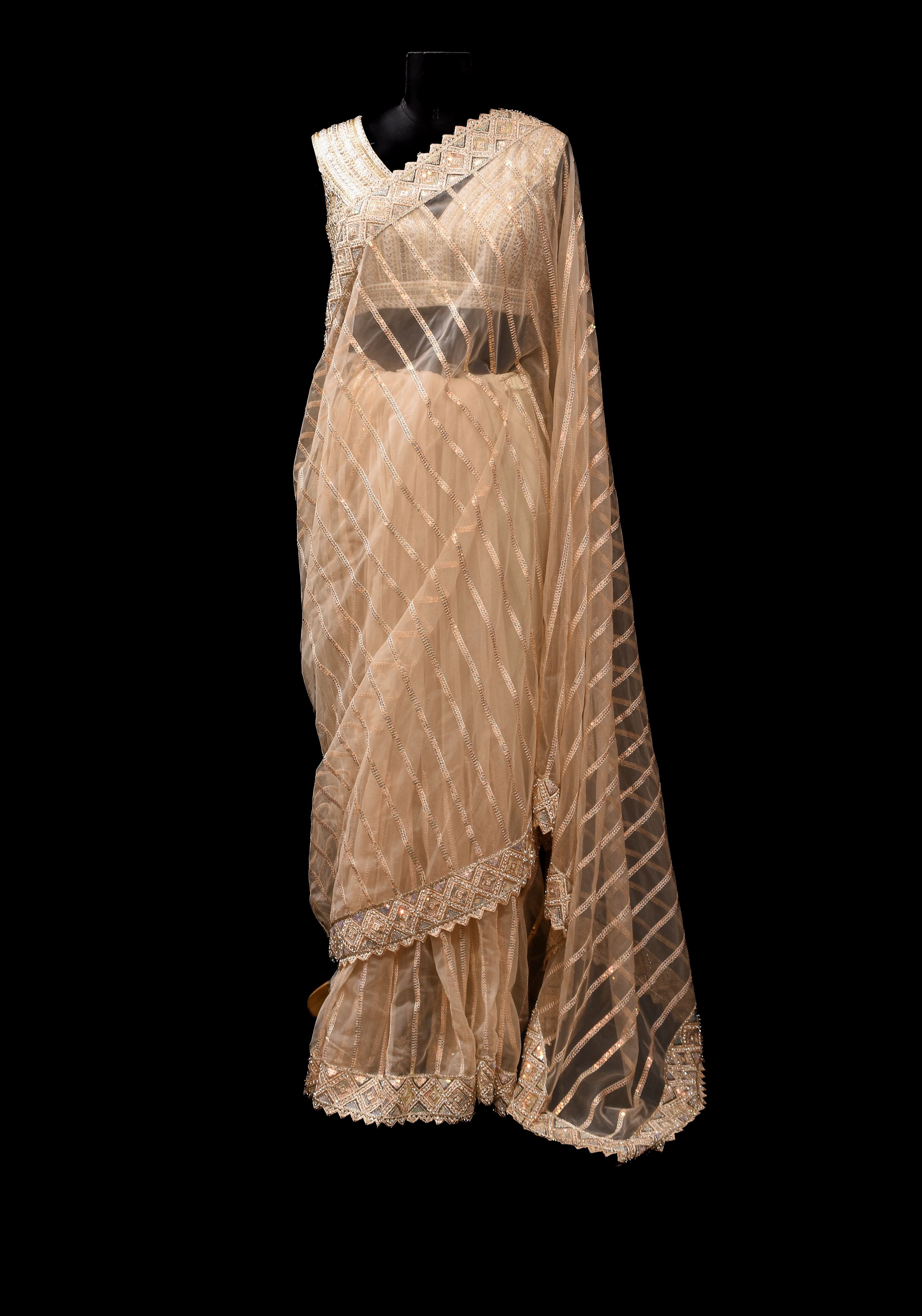 Beige tone Stripes Design Sequins on Net Saree | Shobitam