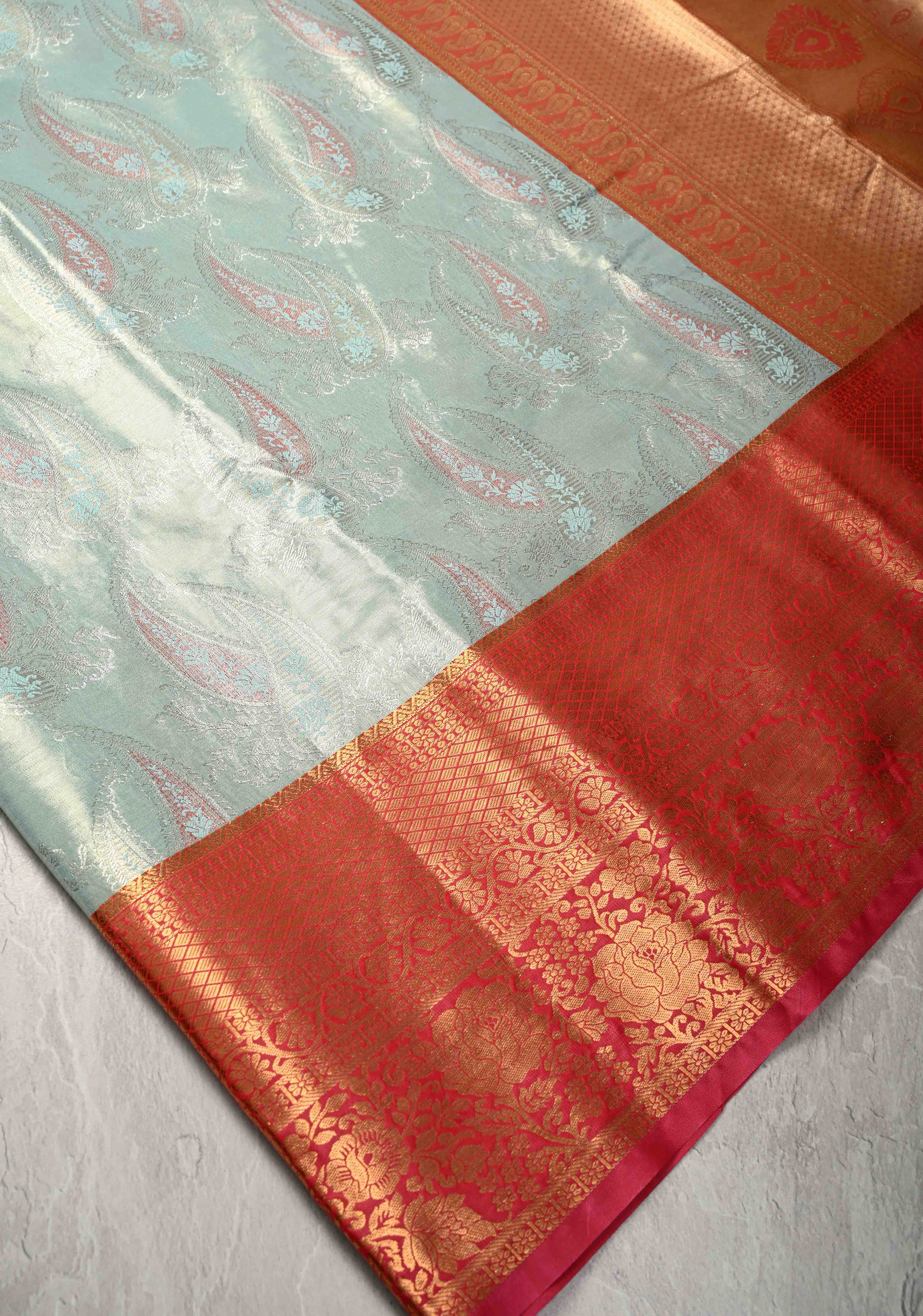 Pastel Green Kanjivaram Tissue Semi Silk Saree with Meenakari Brocade and Contrast Zari Border | Shobitam