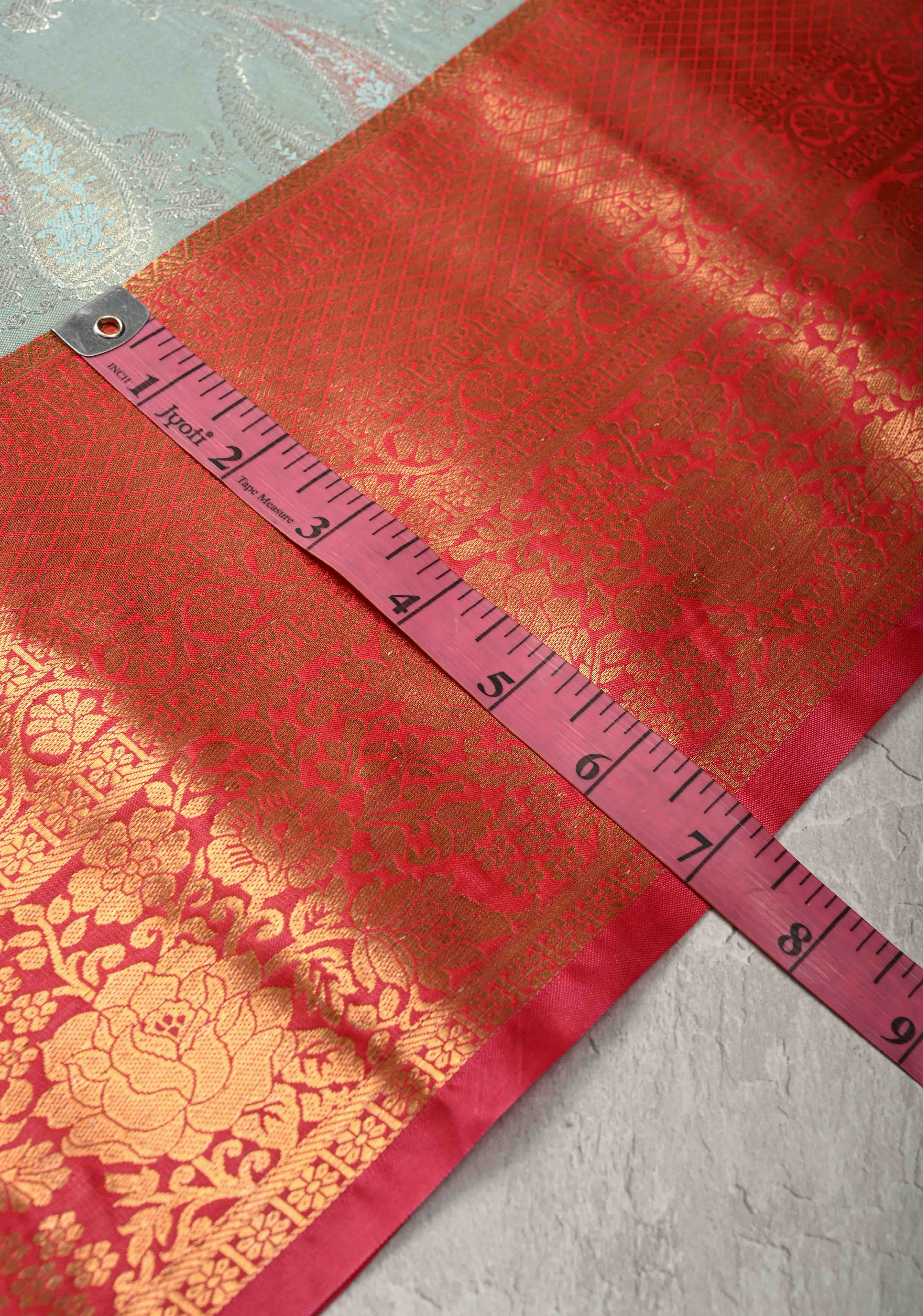 Pastel Green Kanjivaram Tissue Semi Silk Saree with Meenakari Brocade and Contrast Zari Border | Shobitam