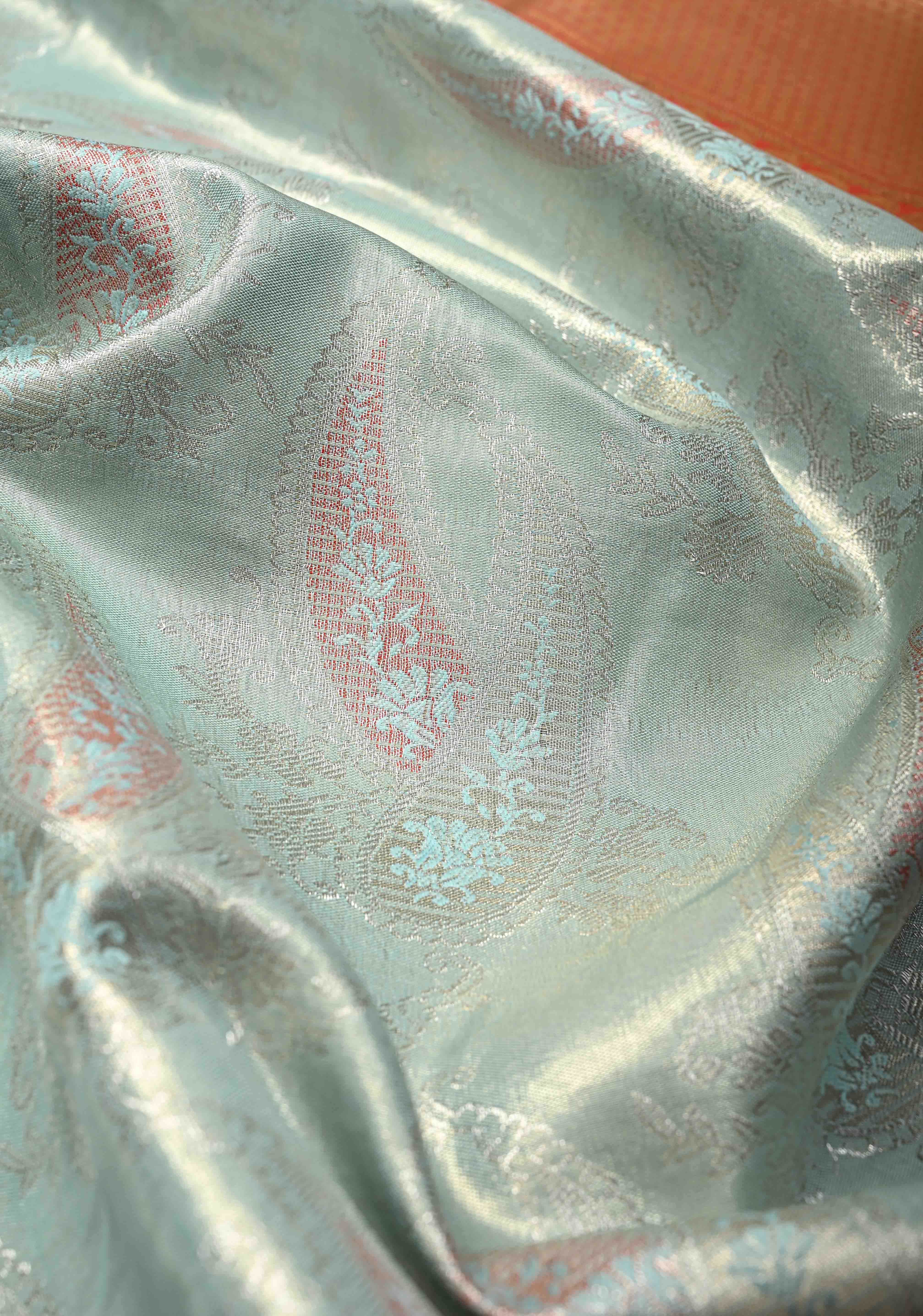Pastel Green Kanjivaram Tissue Semi Silk Saree with Meenakari Brocade and Contrast Zari Border | Shobitam