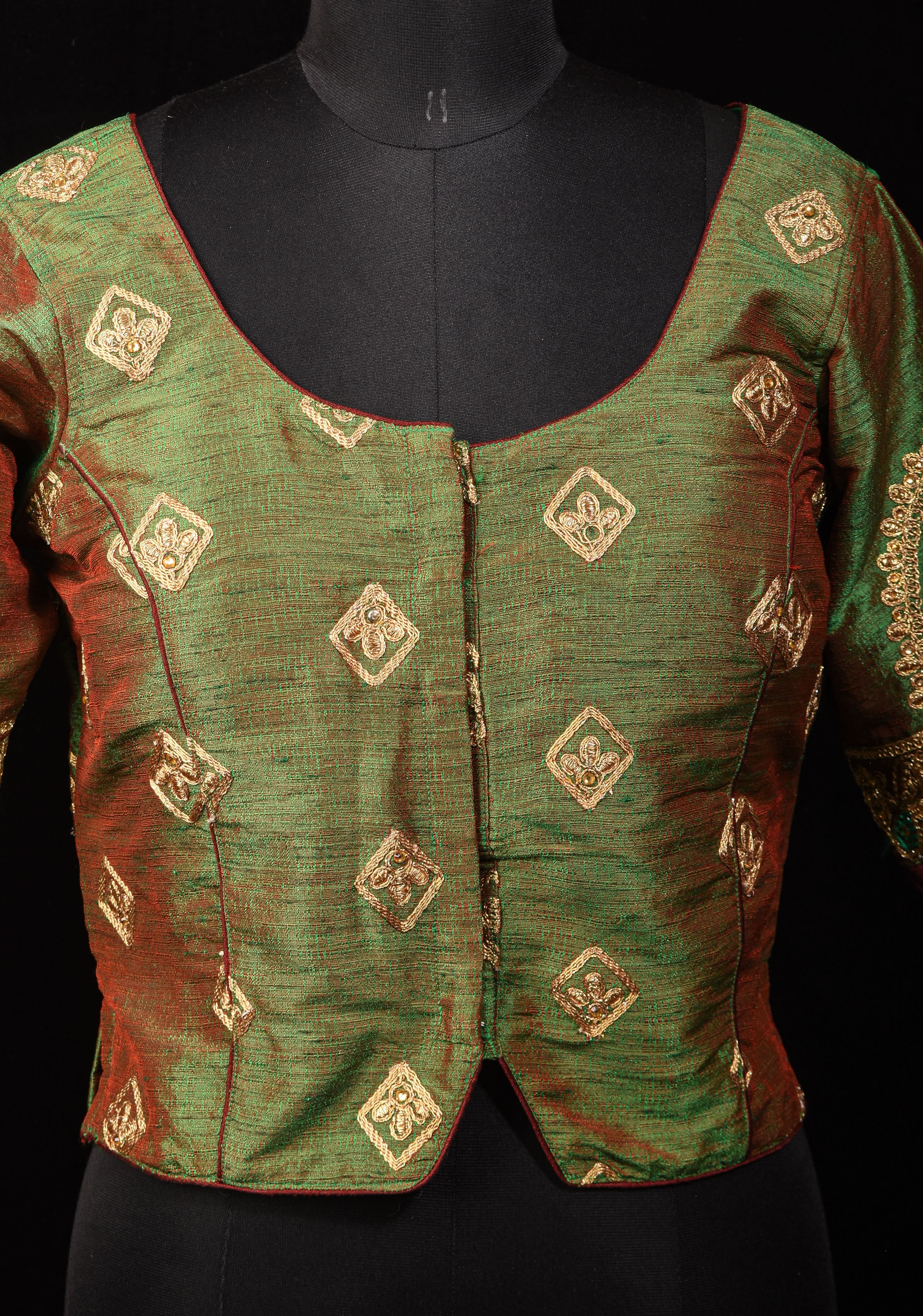 Readymade: Henna Green Semi Raw Silk Medium Length Jacket Blouse with Machine embroidery | Shobitam