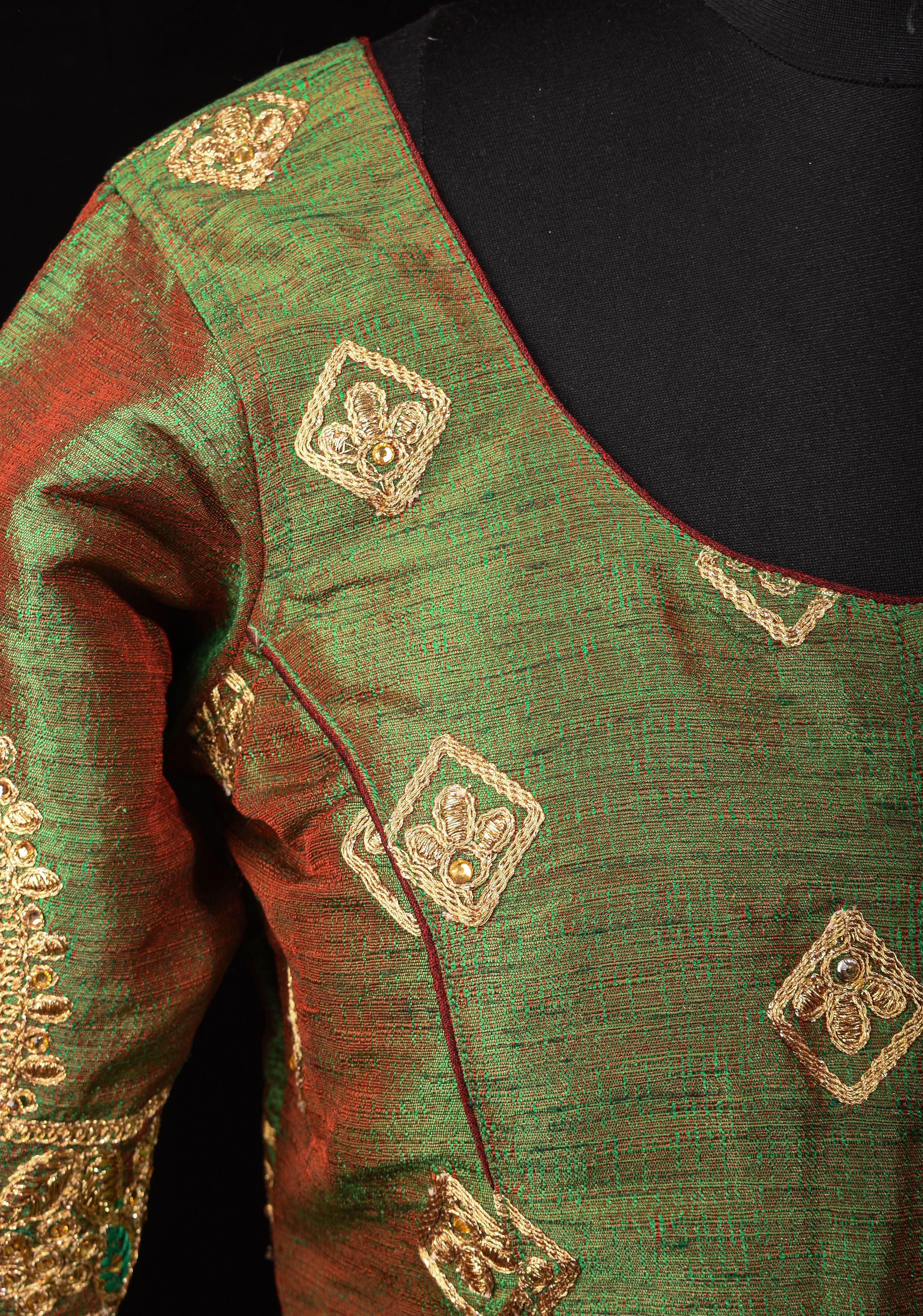 Readymade: Henna Green Semi Raw Silk Medium Length Jacket Blouse with Machine embroidery | Shobitam