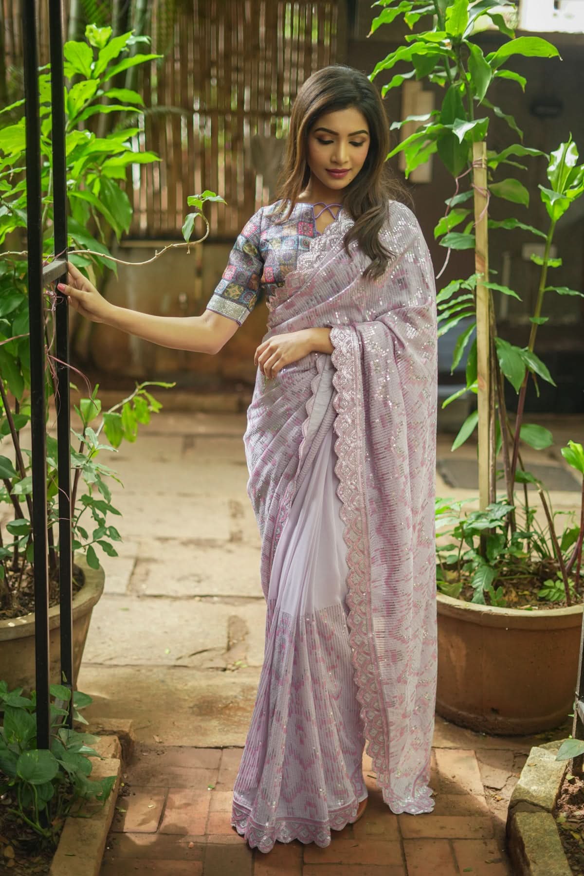 Full Sequins Embellished Georgette Saree in mauve with Scalloped border | Shobitam