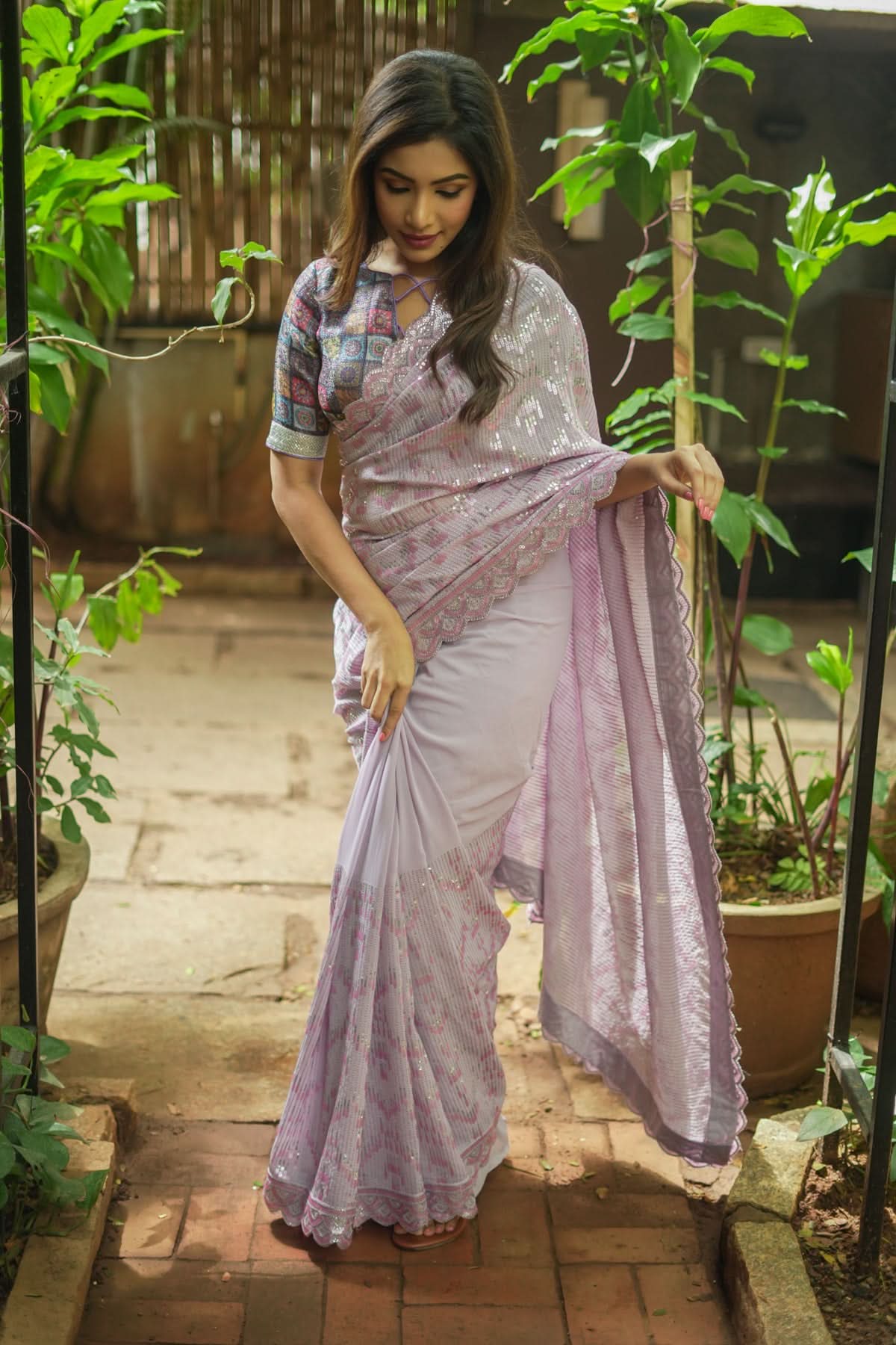Full Sequins Embellished Georgette Saree in mauve with Scalloped border | Shobitam