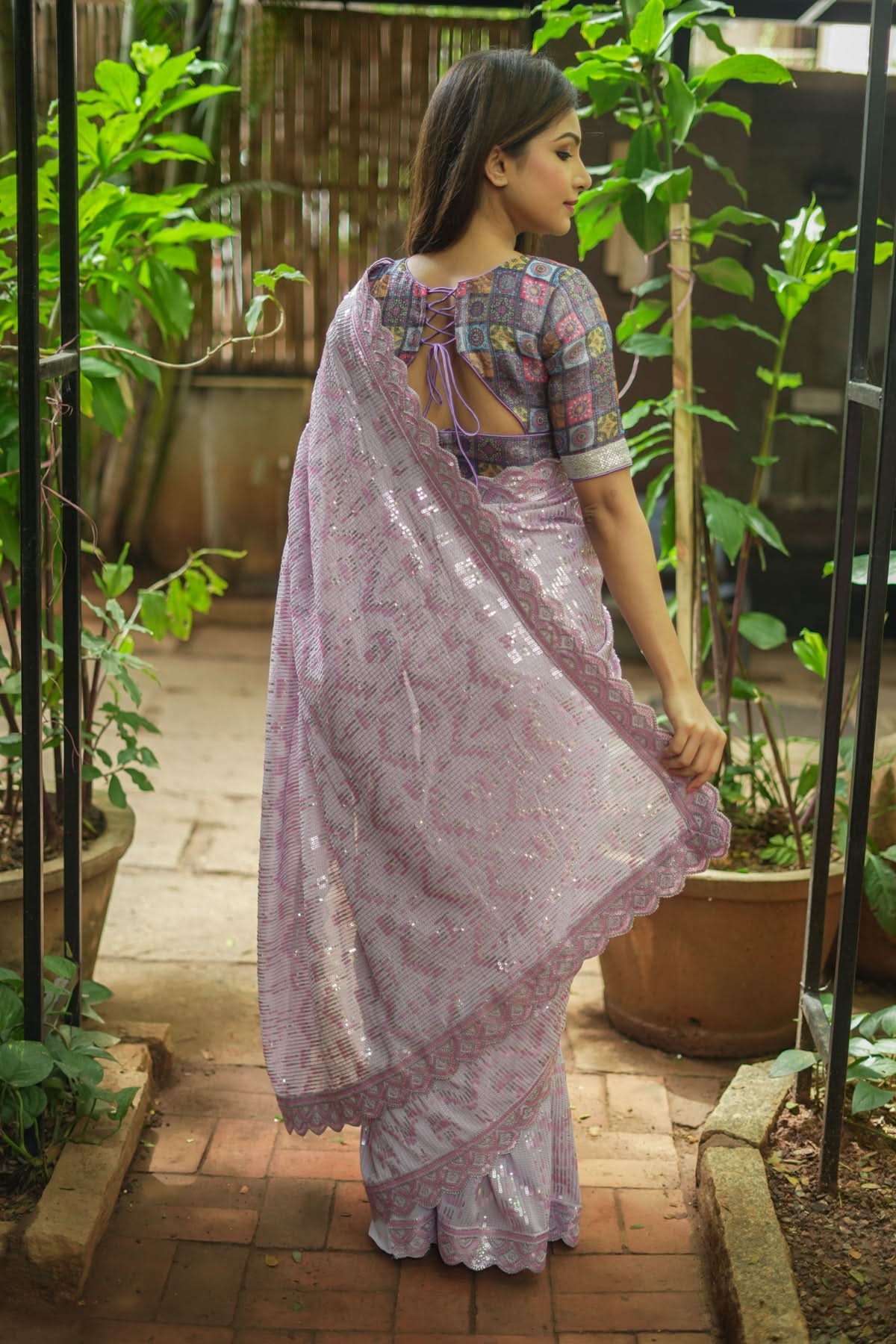 Full Sequins Embellished Georgette Saree in mauve with Scalloped border | Shobitam