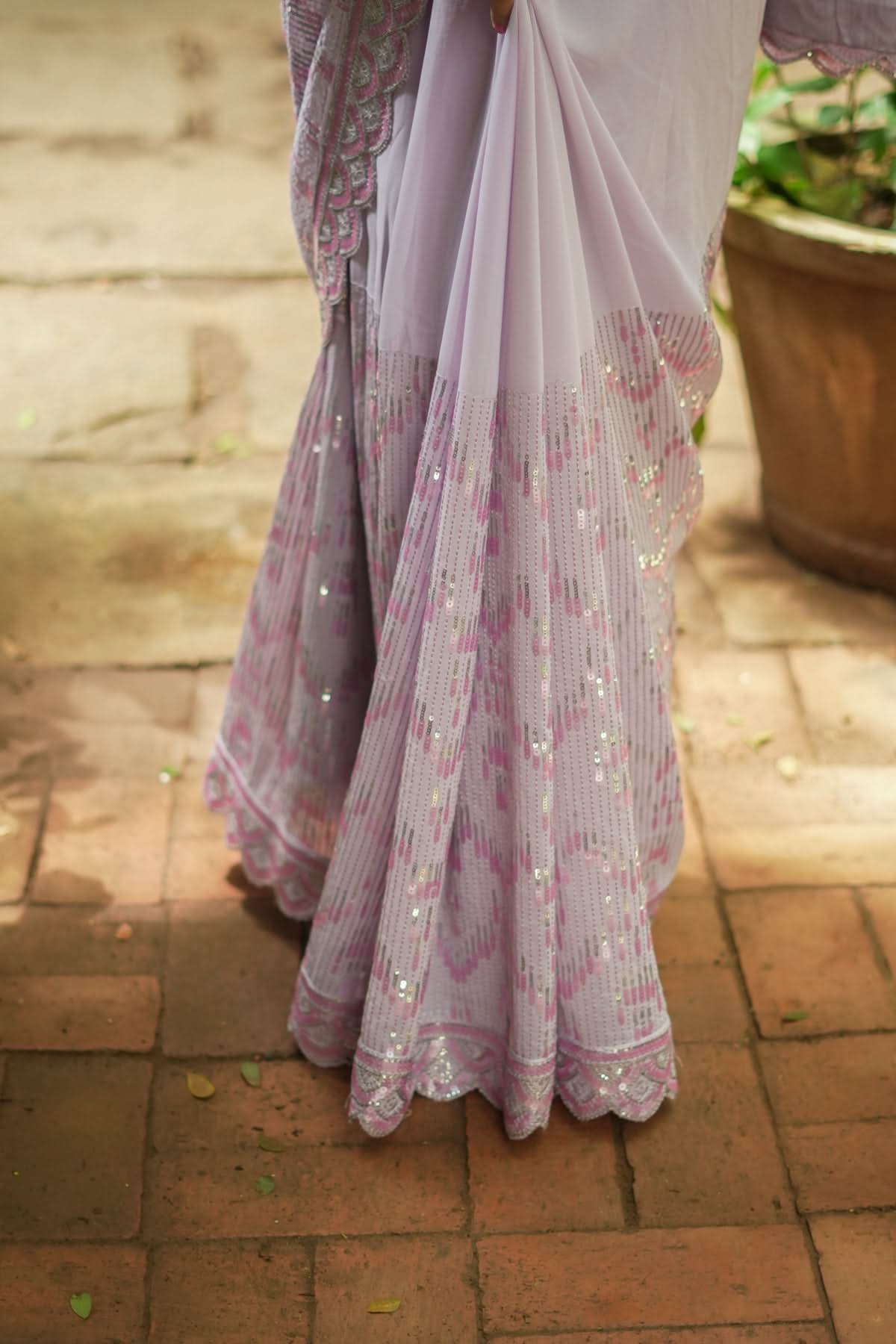 Full Sequins Embellished Georgette Saree in mauve with Scalloped border | Shobitam