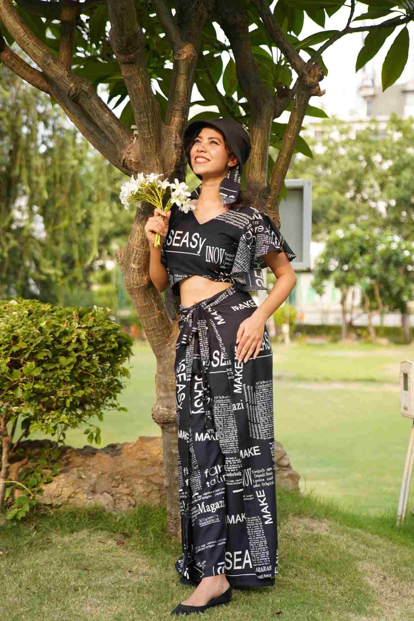Black Co-Ord set with  pant and stylish flair sleeve top with overall Newspaper Print