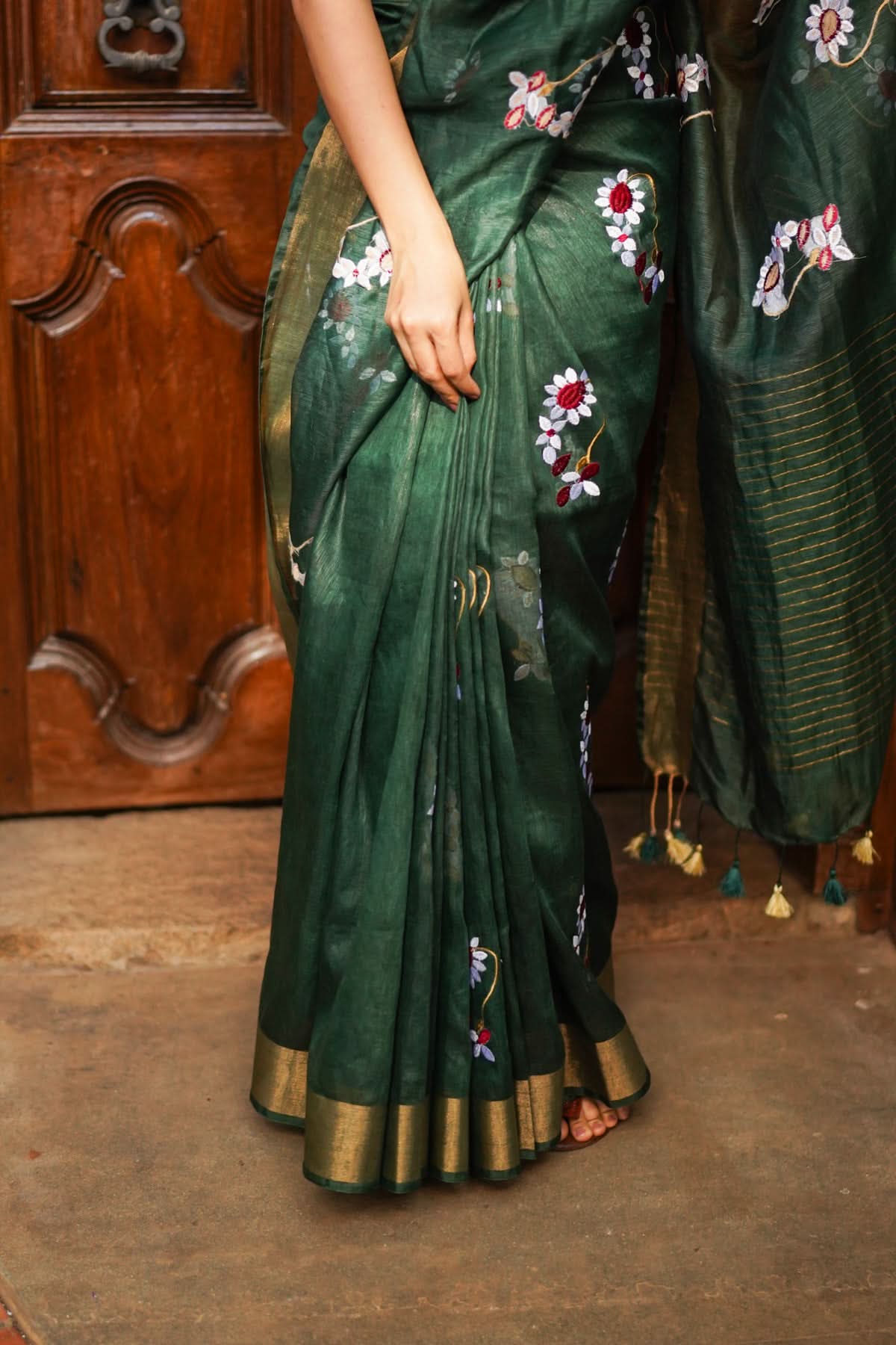 Hunter Green Silk Linen Saree with Moti Nath Embroidery,Woven zari Borders and Long Tassels | Shobitam