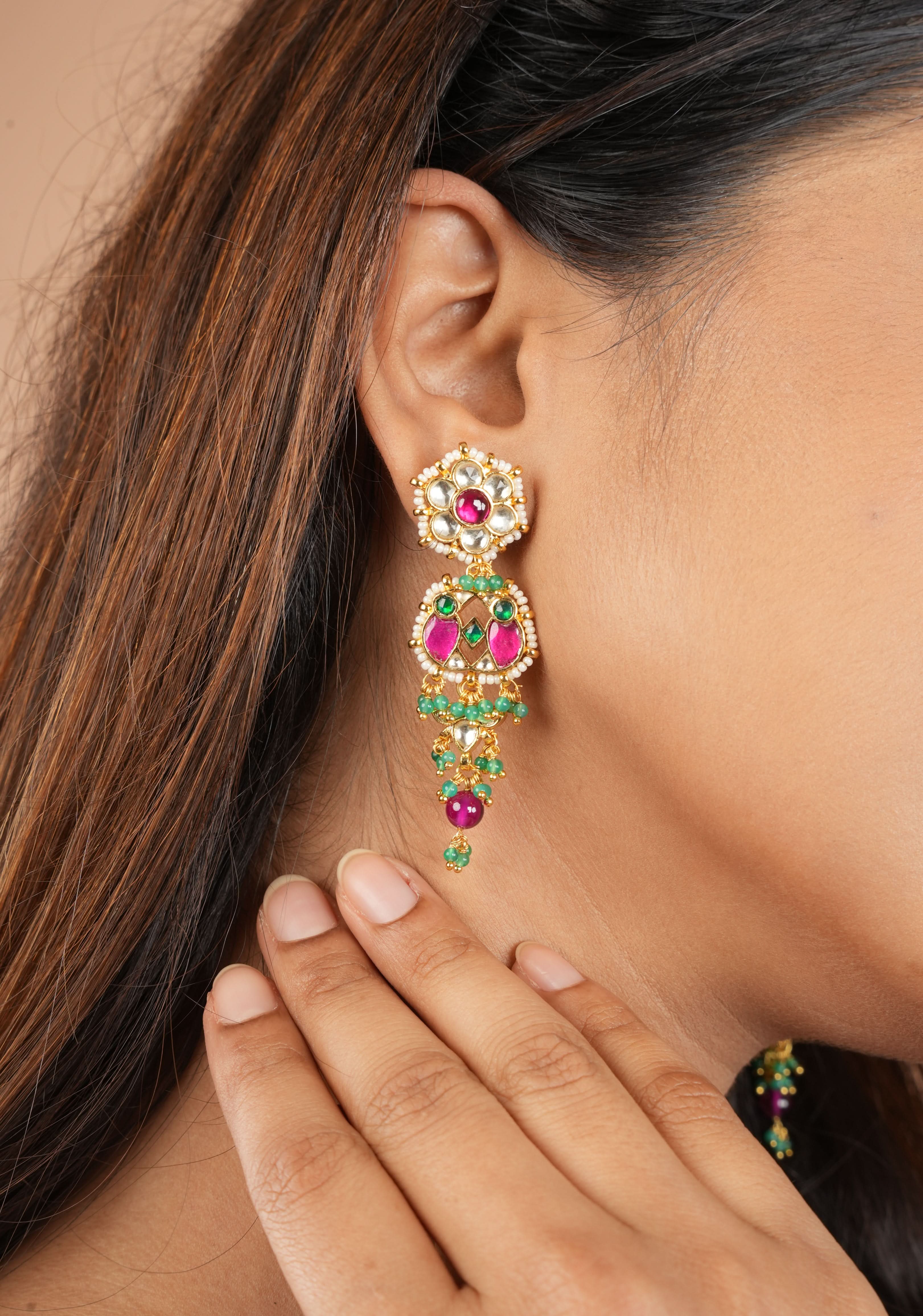 Earrings with flower  embedded in Jadau technique and dangling beads | SHOBITAM