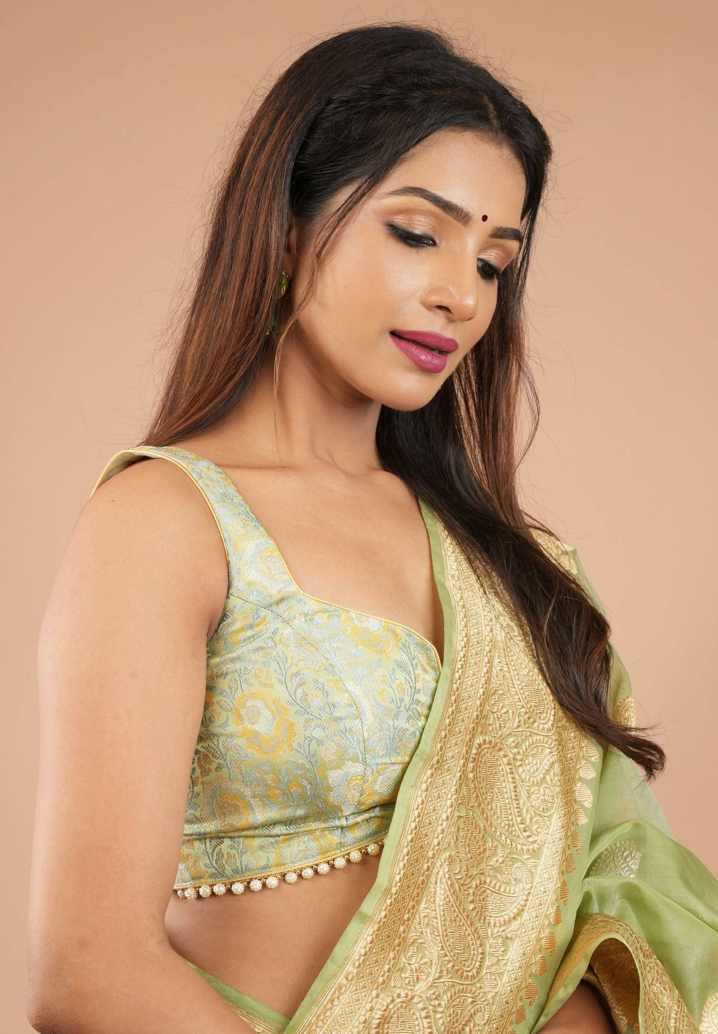 Pista Green Tanchoi Floral sleeveless blouse with beaded trim detailing, Customizable, Made to order | Shobitam