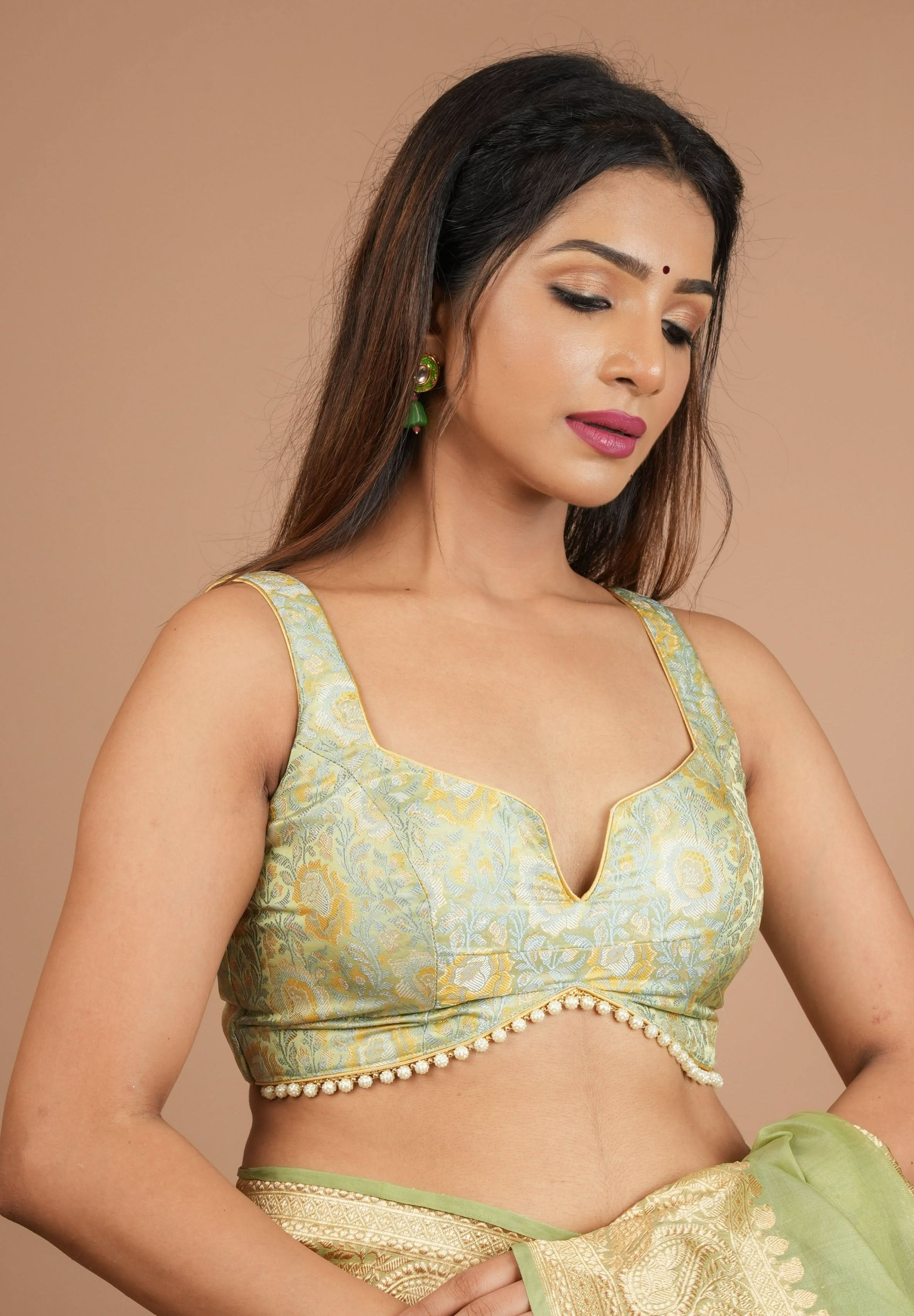 Pista Green Tanchoi Floral sleeveless blouse with beaded trim detailing, Customizable, Made to order | Shobitam