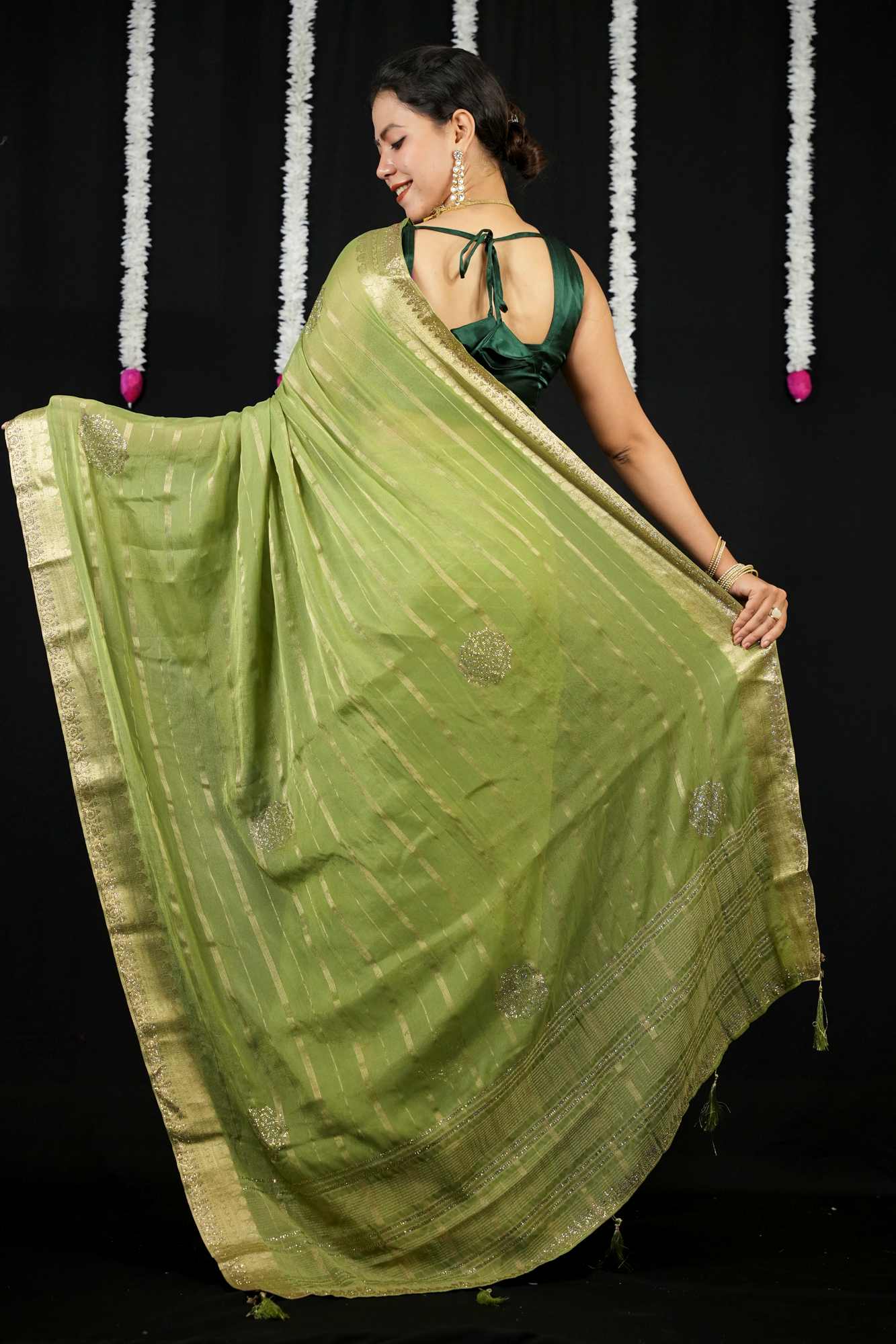 Chiffon with Zari Stripes, Floral Motifs & Stone Embellishments Ready To wear Saree