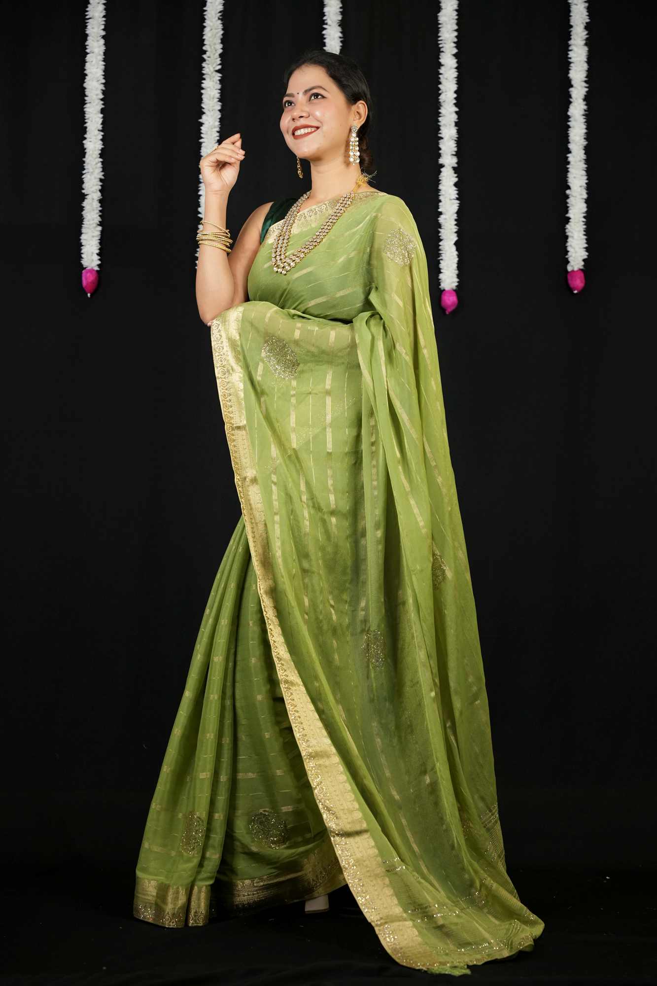 Chiffon with Zari Stripes, Floral Motifs & Stone Embellishments Ready To wear Saree