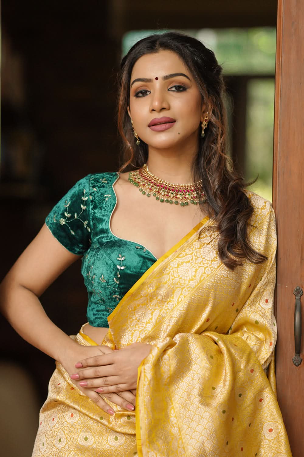 Rama green velvet with Antique Gold sequins Arch Neck blouse, Made to Order | SHOBITAM