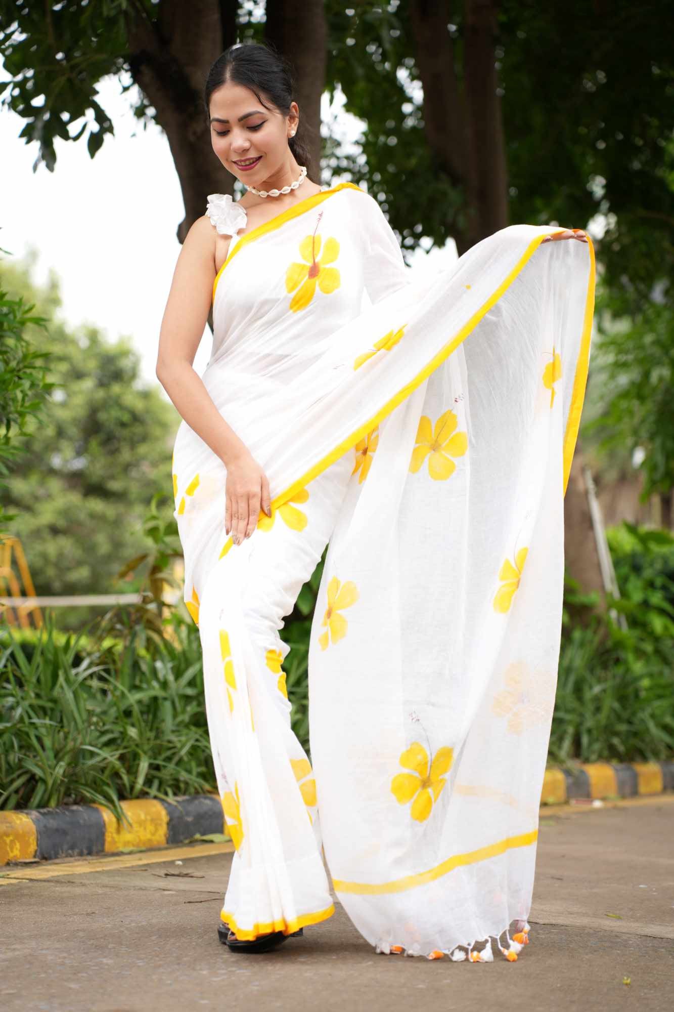 Soft White & Musturd Foral Print Mul Mul Cotton With Pom Pom On border Pre Drape Saree