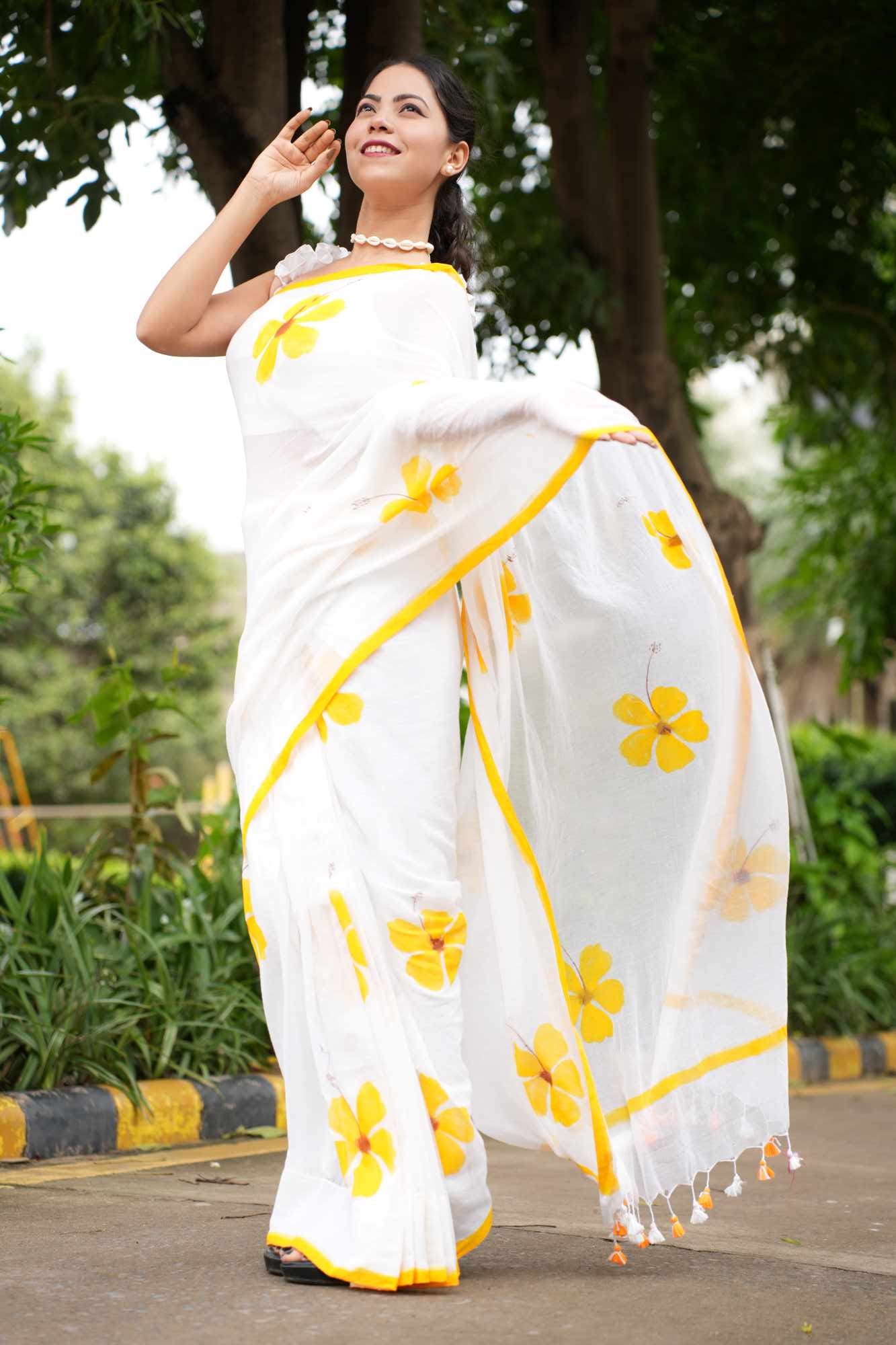 Soft White & Musturd Foral Print Mul Mul Cotton With Pom Pom On border Pre Drape Saree