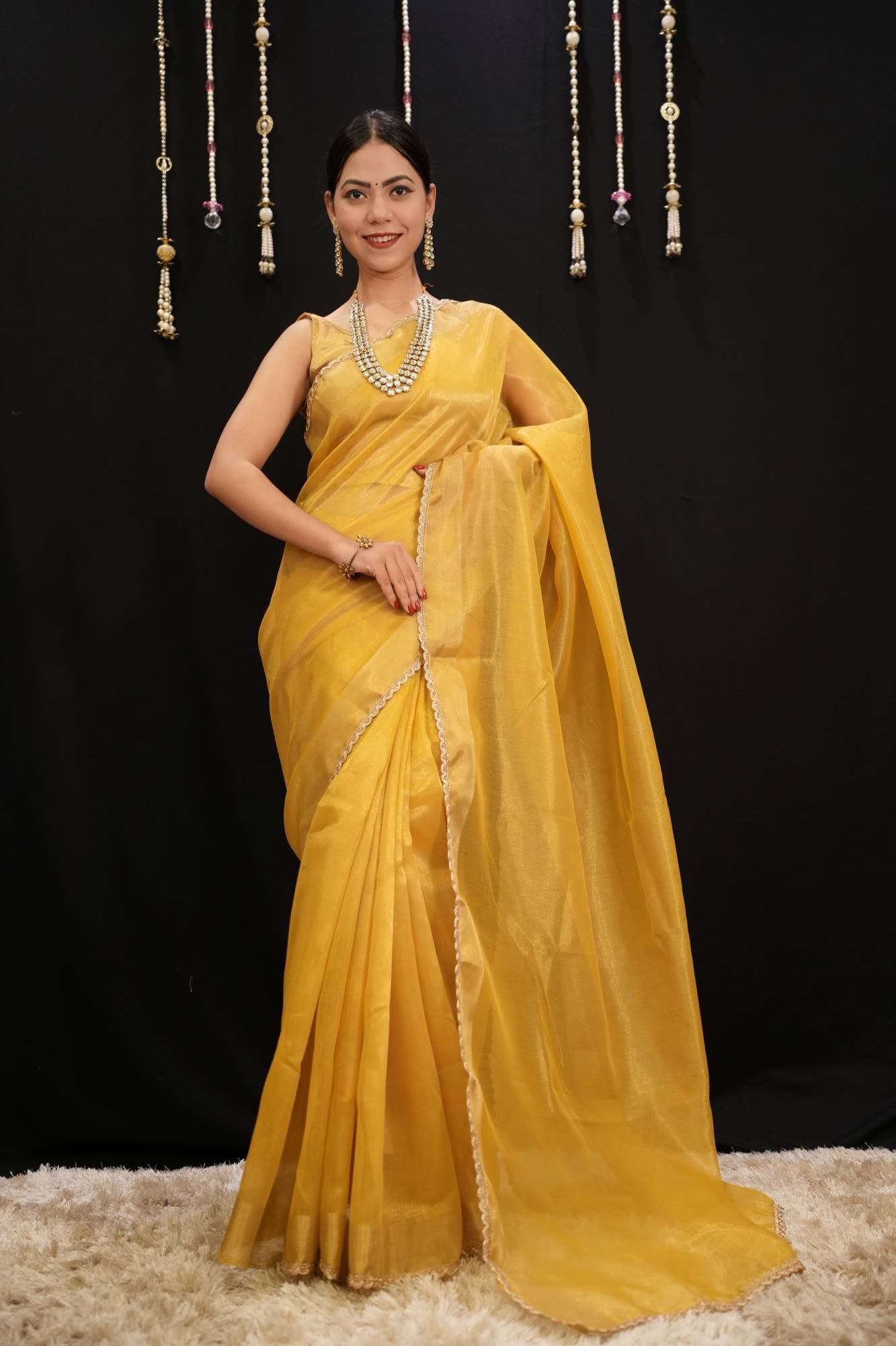 Mustard Yellow Soft Jimmy choo Fabric With Zari Weave Border And Golden Zari Piping Lace Pre Drape Saree