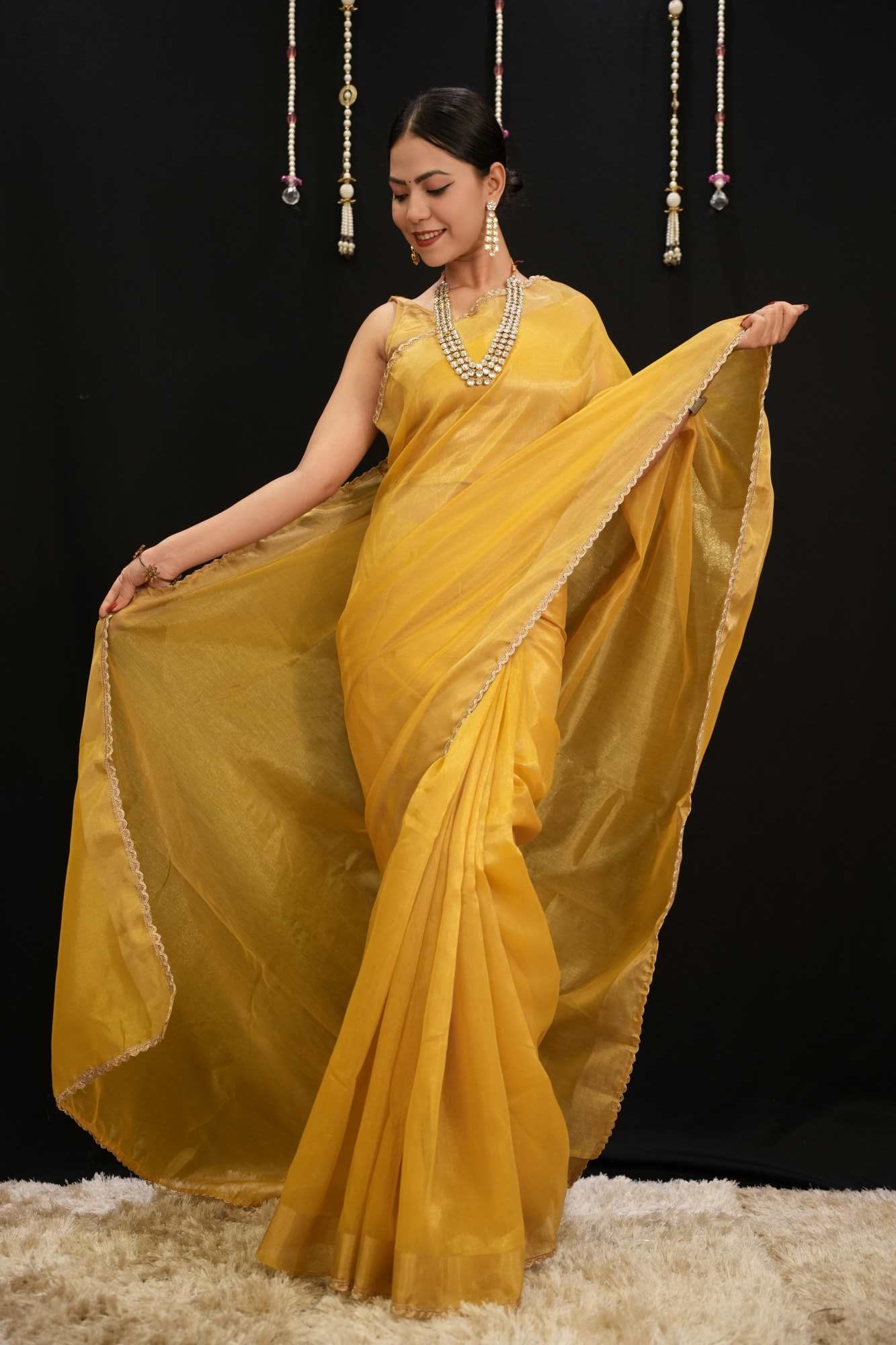 Mustard Yellow Soft Jimmy choo Fabric With Zari Weave Border And Golden Zari Piping Lace Pre Drape Saree