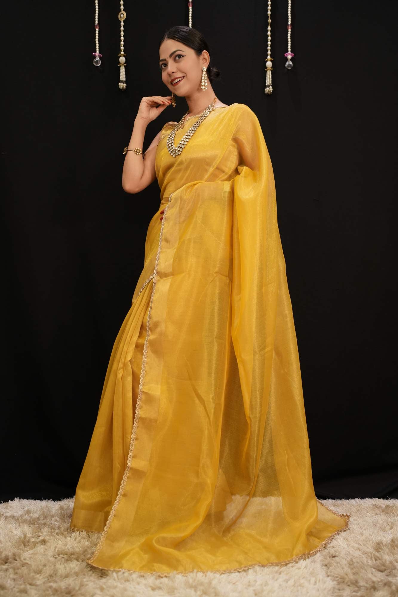 Mustard Yellow Soft Jimmy choo Fabric With Zari Weave Border And Golden Zari Piping Lace Pre Drape Saree