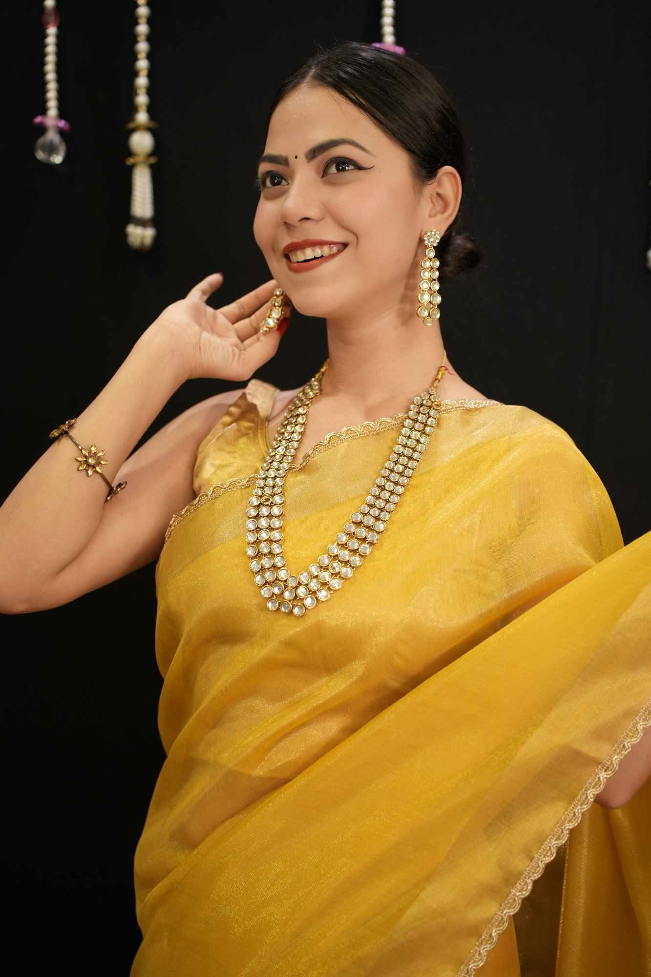 Mustard Yellow Soft Jimmy choo Fabric With Zari Weave Border And Golden Zari Piping Lace Pre Drape Saree