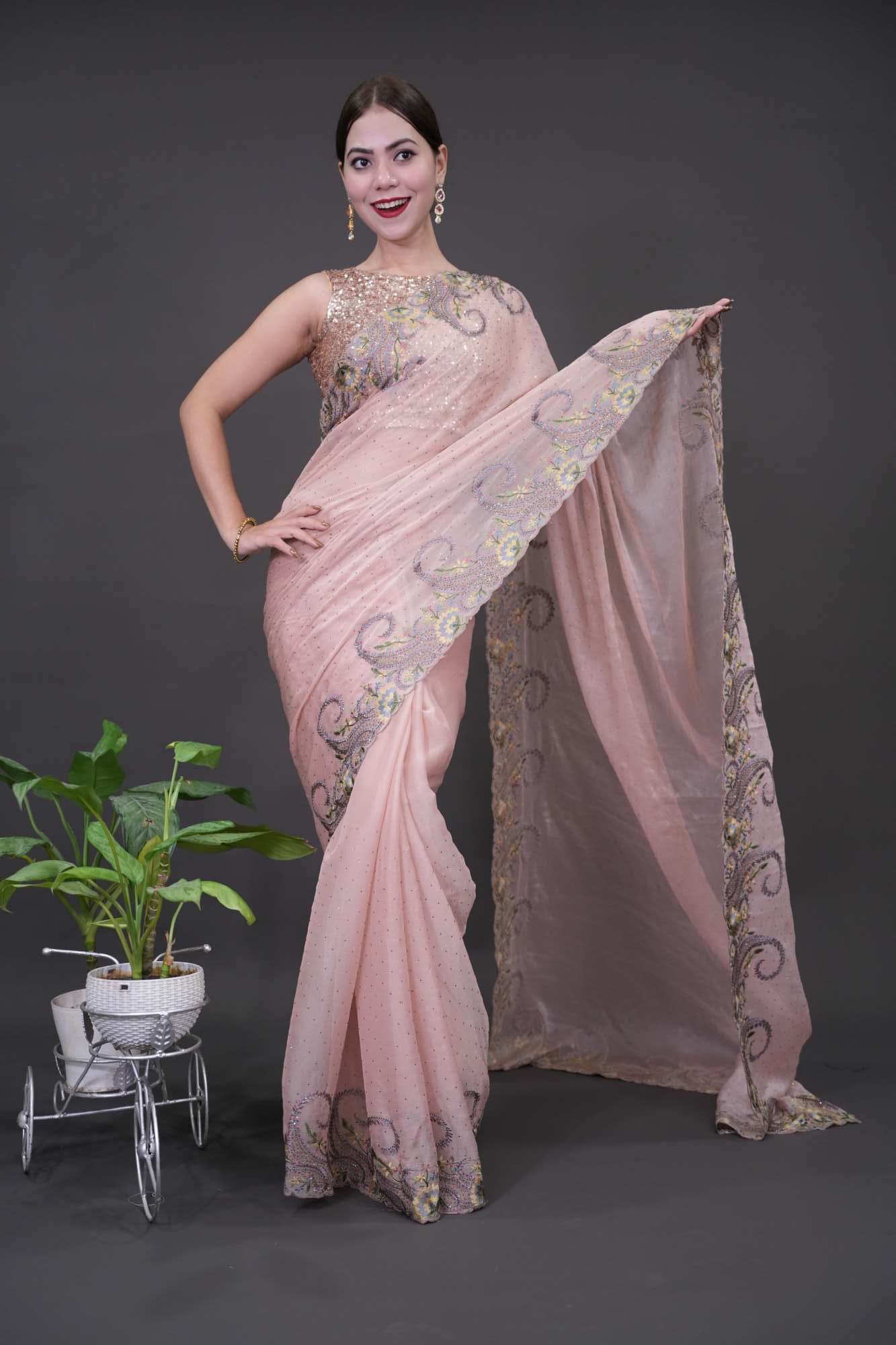 Soft & Shimmery Jimmy Choo  With Golden  & Sequin Embroidered Pre Drape Saree