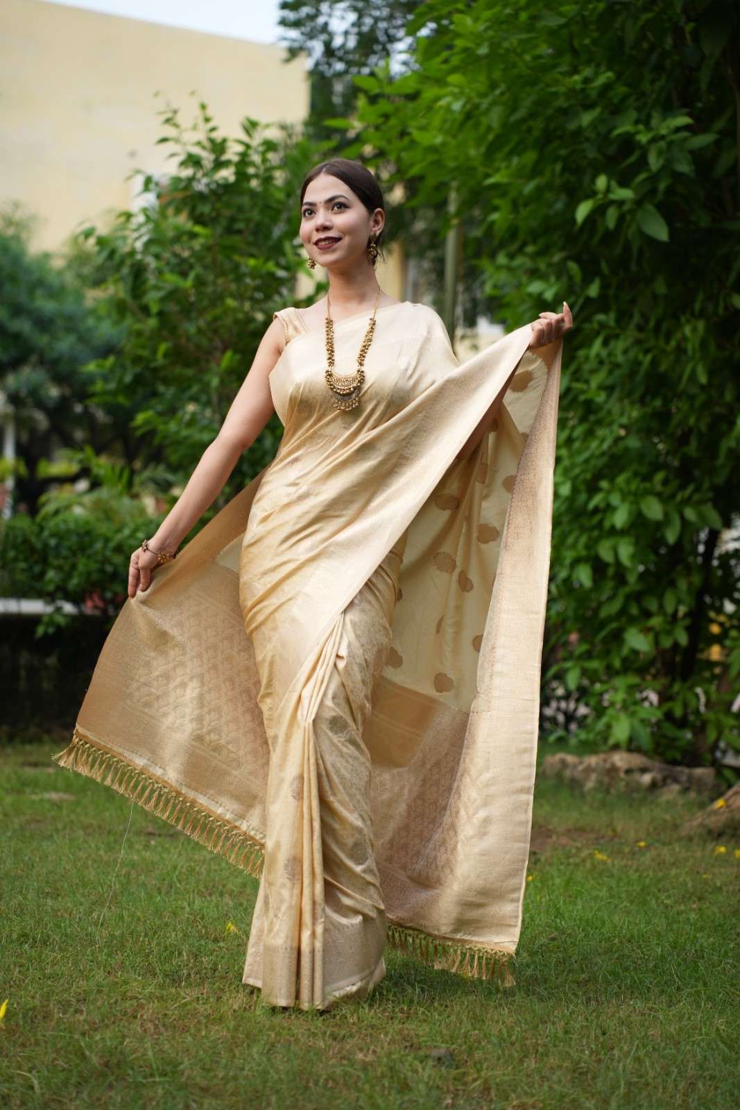 Beige Kanjivaram Soft Silk With Golden Zari Motif & Tassels On Palla Ready To Wear Saree