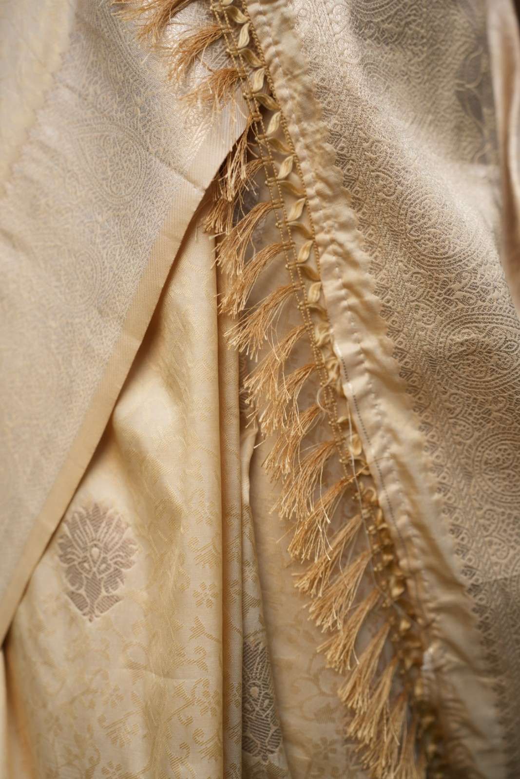 Beige Kanjivaram Soft Silk With Golden Zari Motif & Tassels On Palla Ready To Wear Saree