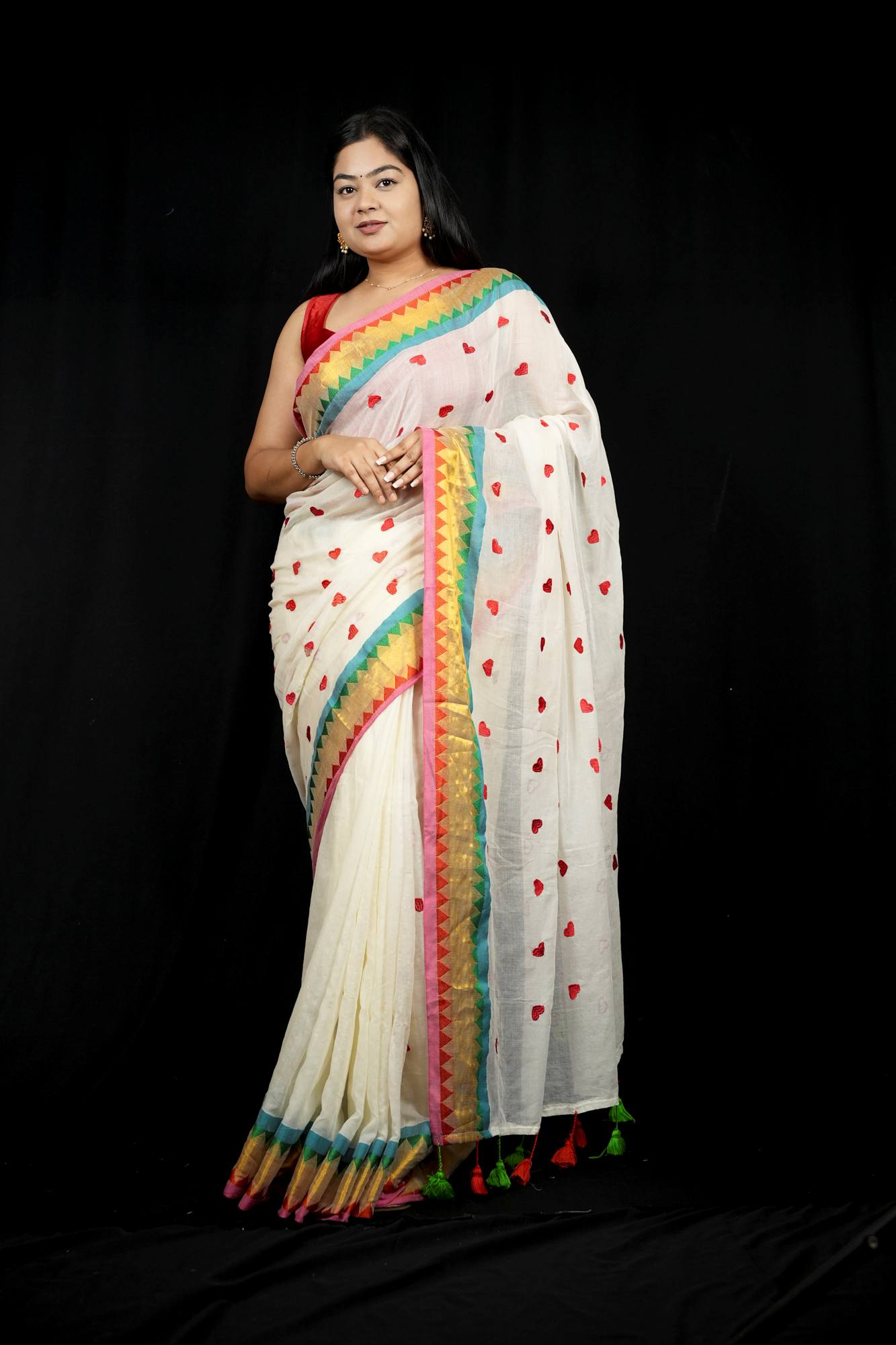 Handcrafted Mulmul Cotton with Geometric Border and Tassel Ready To wear Saree