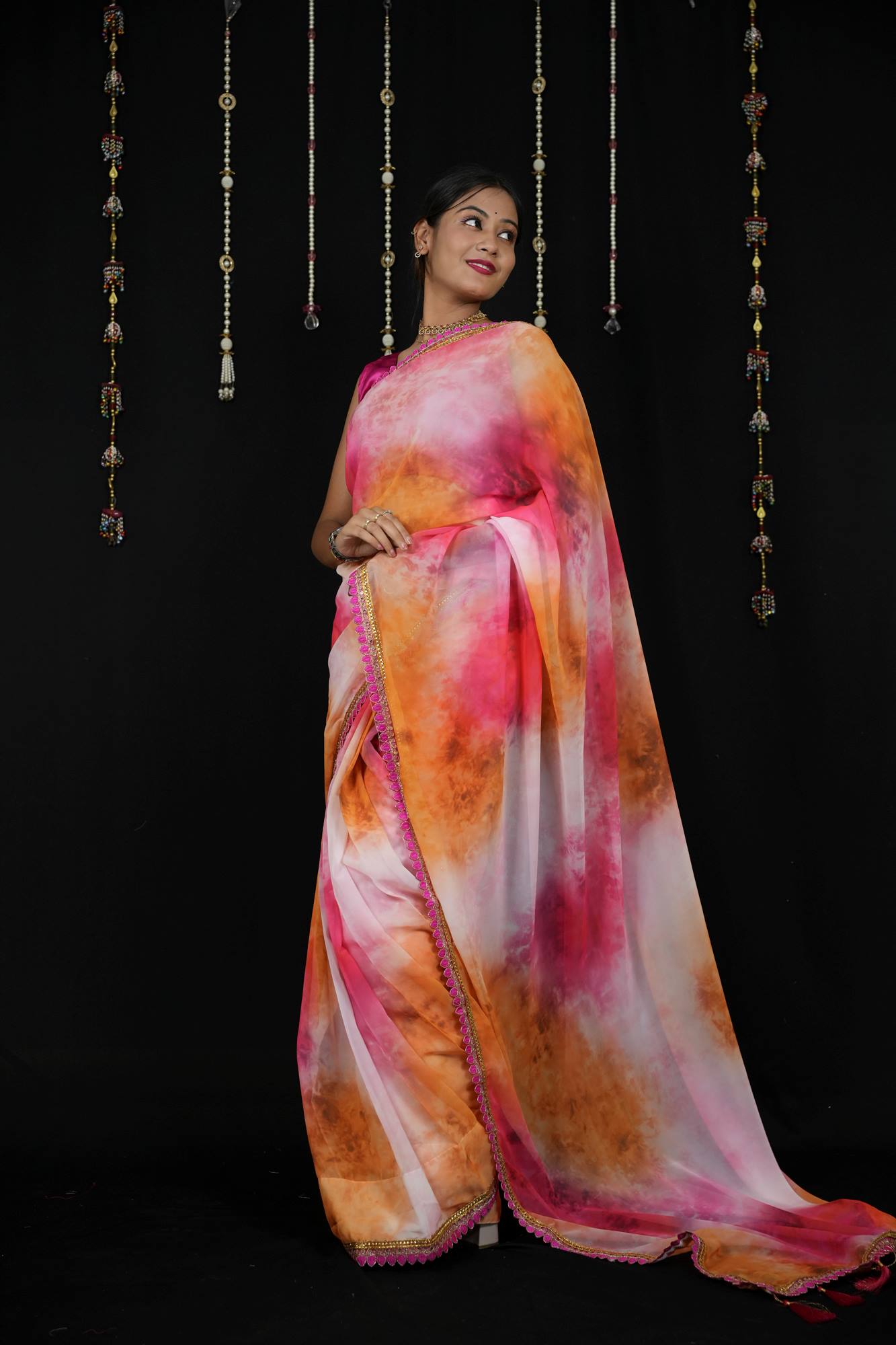Georgette Tie-Dye in Pink, Orange, and White with Tassels Ready To Wear Saree
